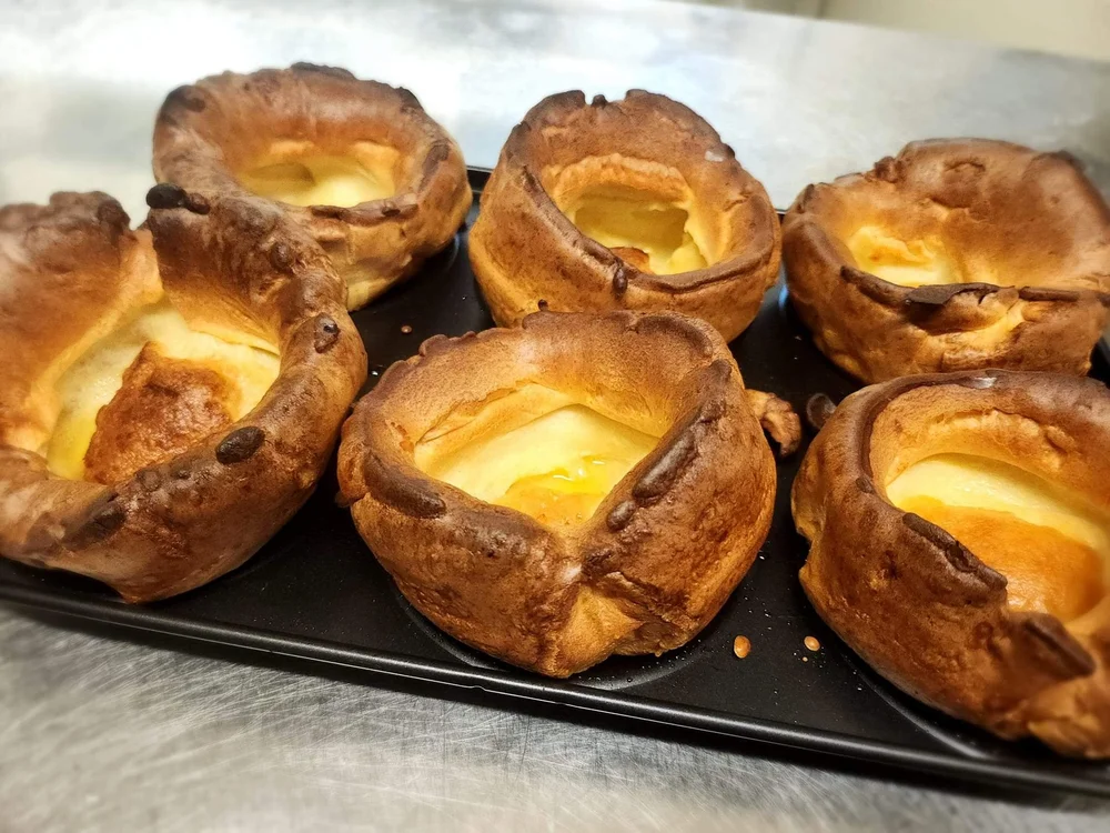 Yorkshire puddings in a baking tray