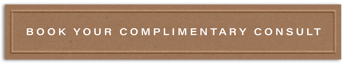tan embossed paper label that reads, "Book your complimentary consultation"