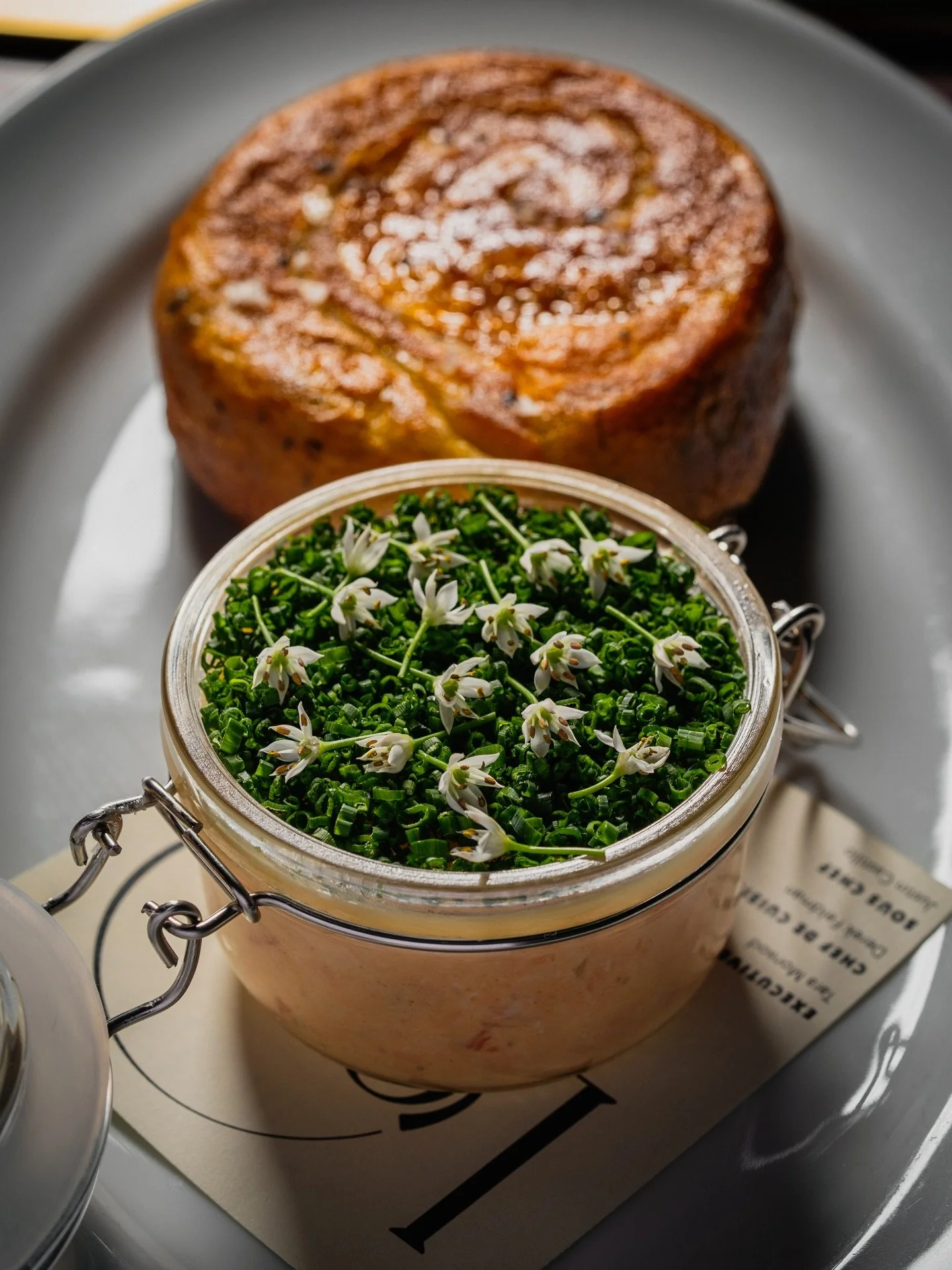 Salmon Rillette, a p&acirc;t&eacute;-style spread, served with warm garlic-chive bing bread. A little French, a little Chinese, and every reason you&rsquo;re not skipping starters tonight.