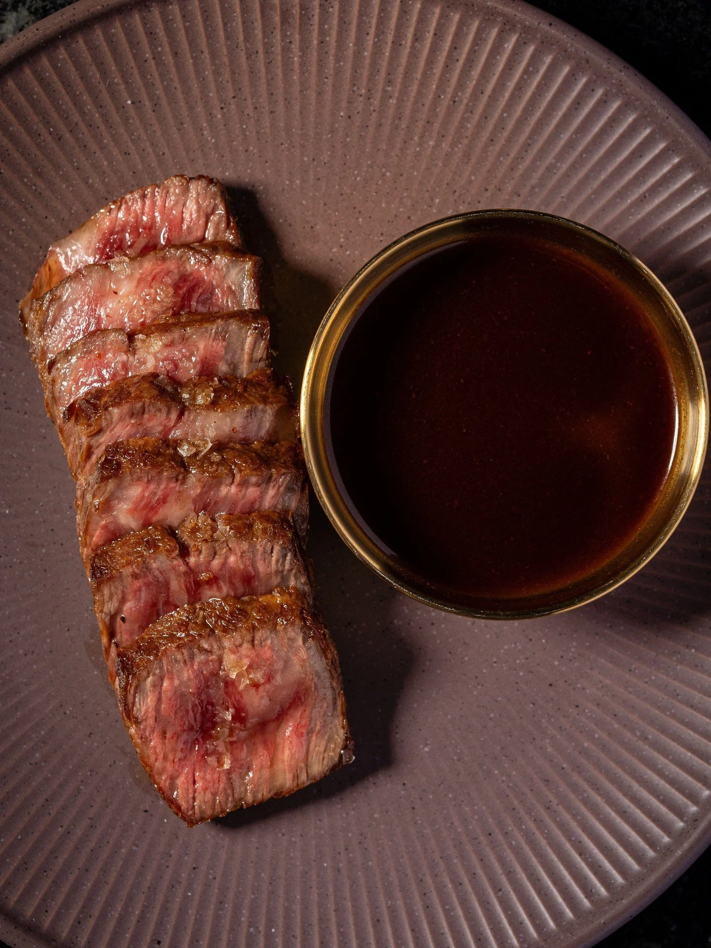 Worth slowing down for, one bite at a time. A5 Wagyu, seared, sliced, and served with a side of Bordelaise.