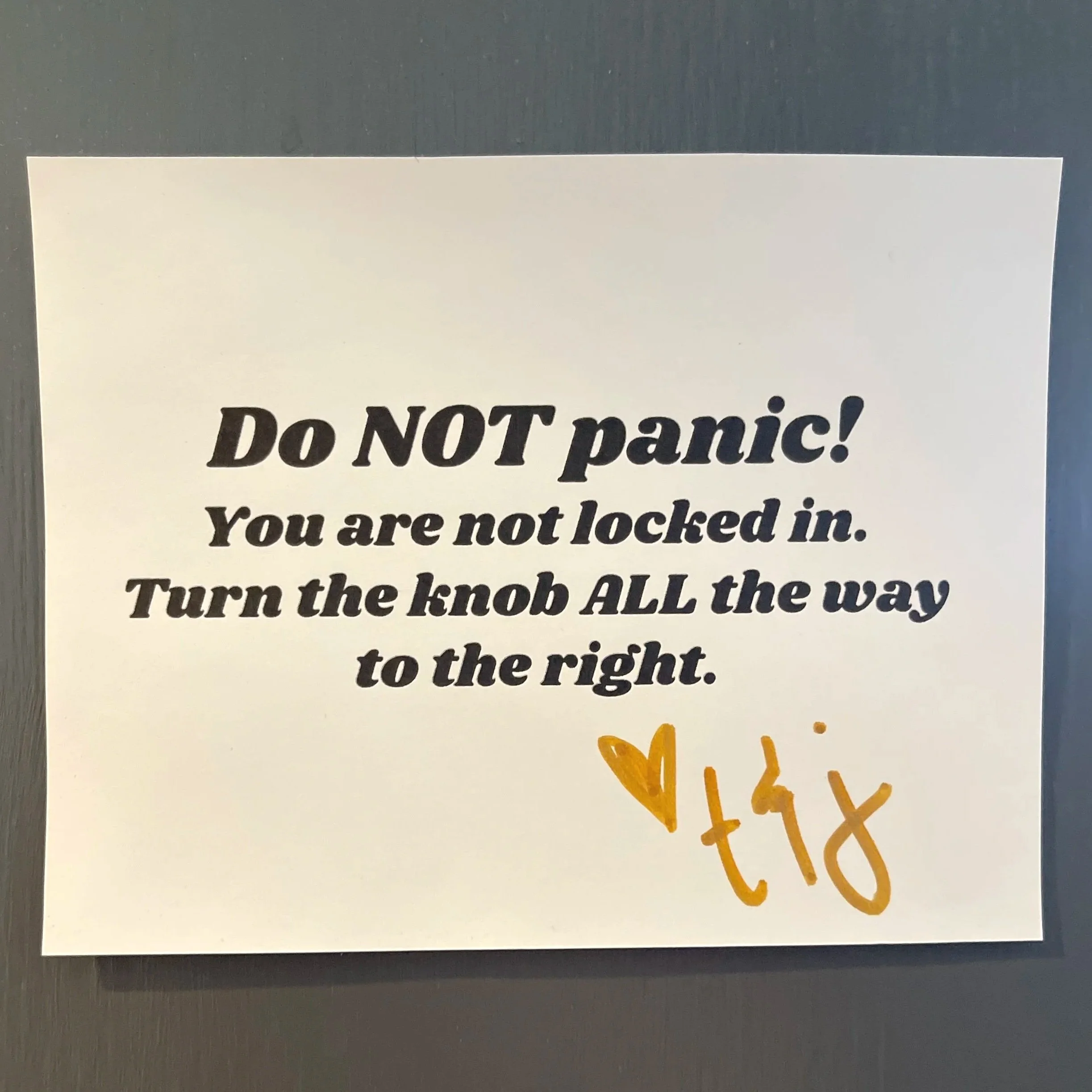 do not panic. you are not locked in bathroom sign