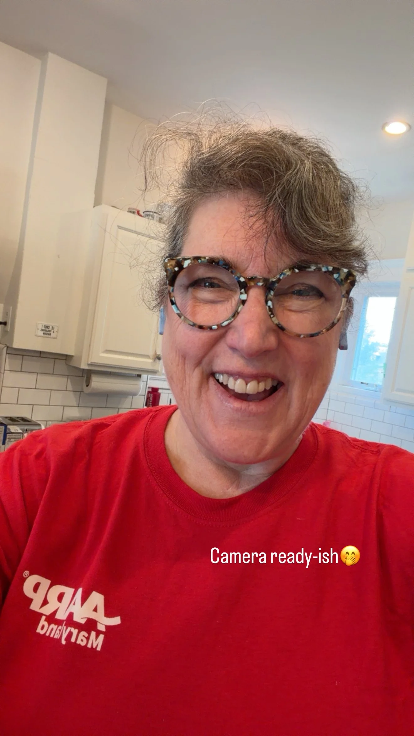 smiling woman wearing red shirt