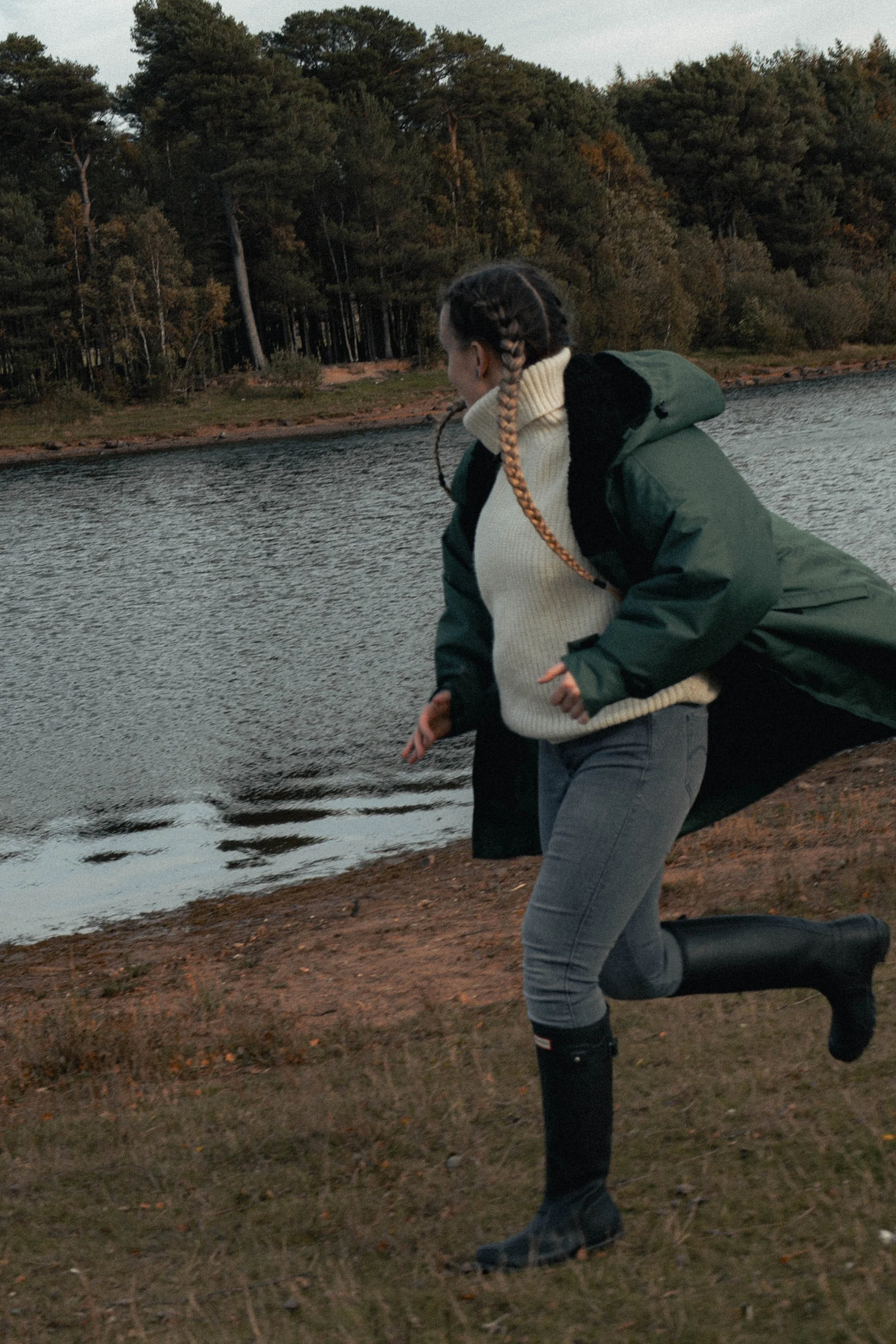 Model wearing The Ootsider jacket in Edinburgh, showcasing sustainable fashion designed to support homelessness initiatives.