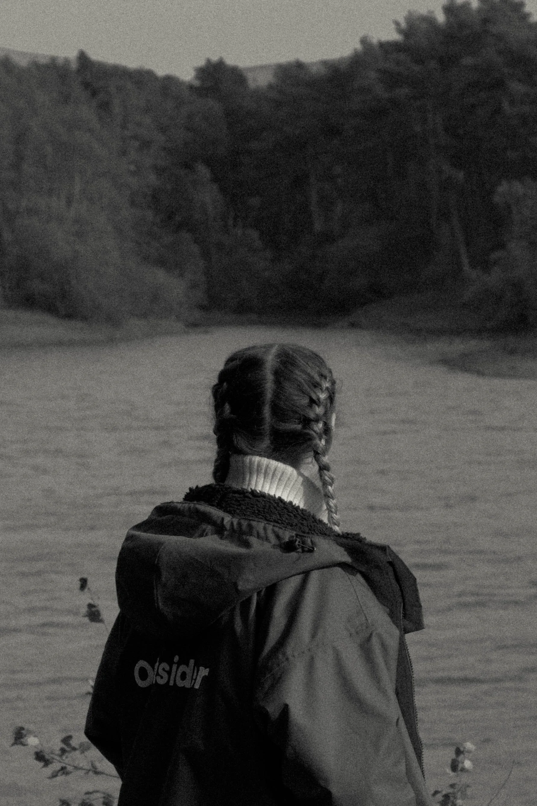 Model wearing The Ootsider jacket in Edinburgh, showcasing sustainable fashion designed to support homelessness initiatives.