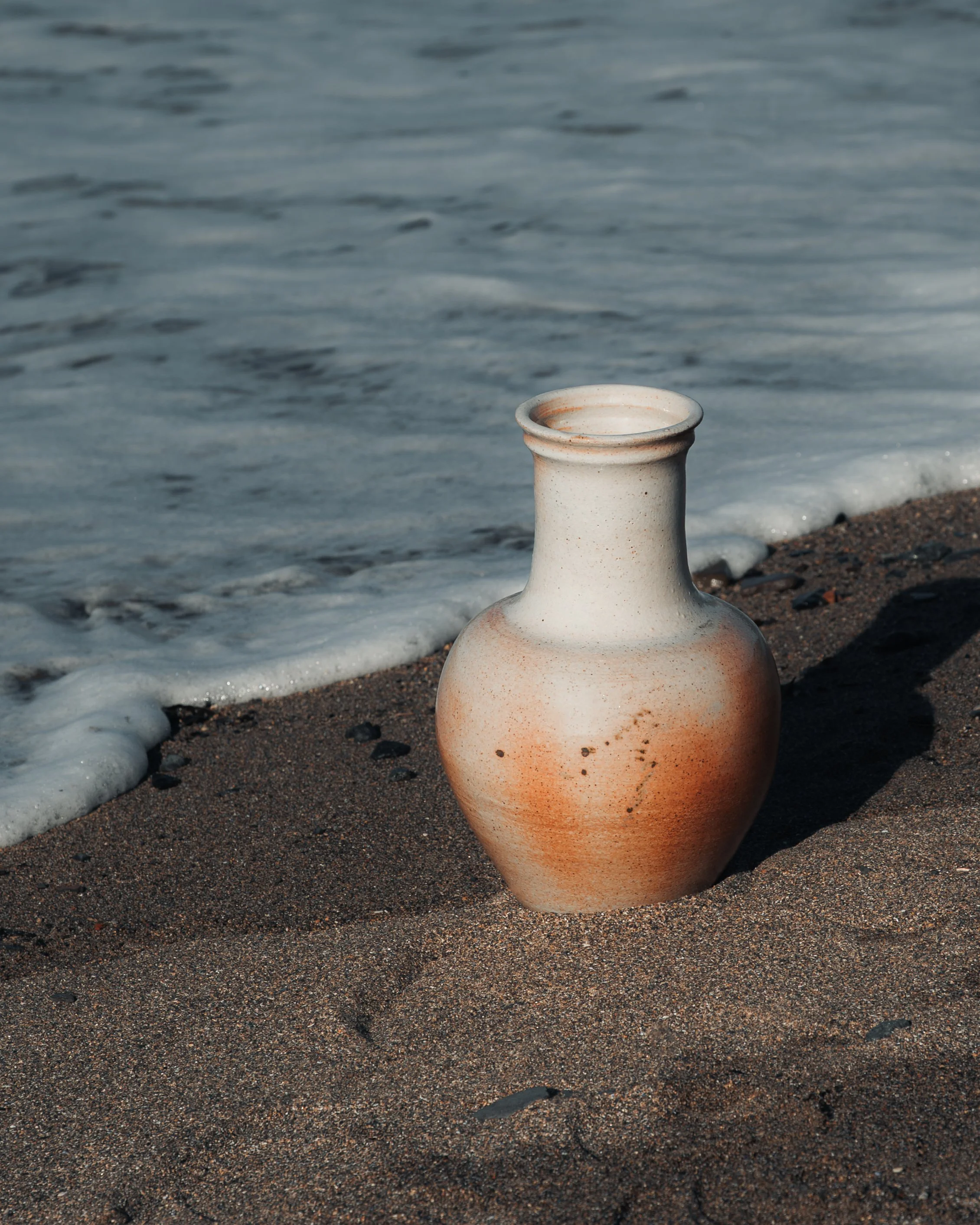 Contemporary pottery photographed with soft natural light.