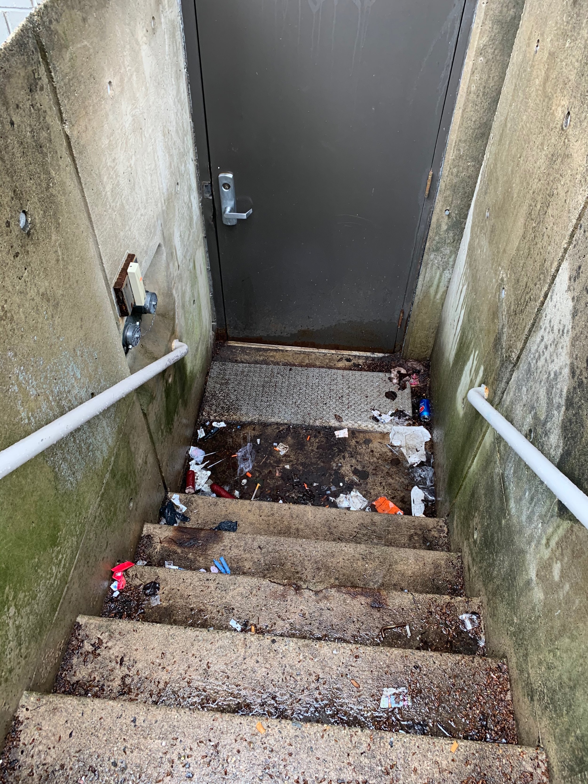 Needles and other drug use supplies and human excrement, East Brookline Street
