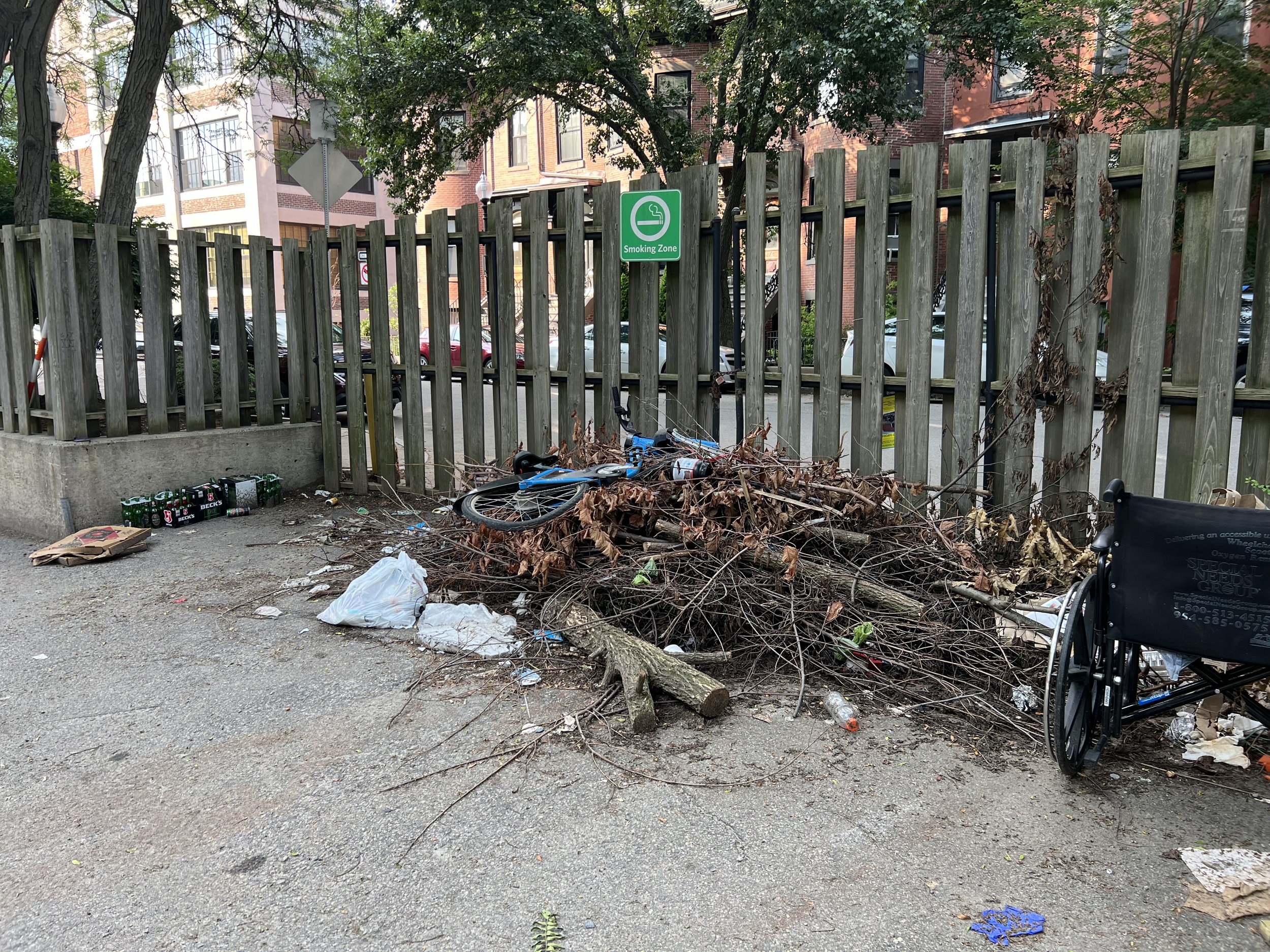 Stolen Bluebike and abandoned wheelchair, East Brookline Street