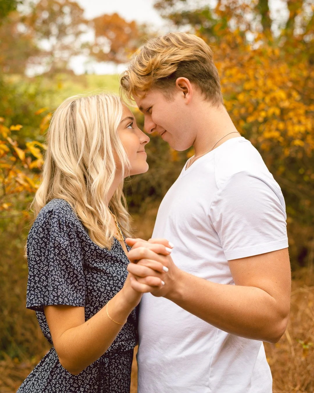 Couple holding hands