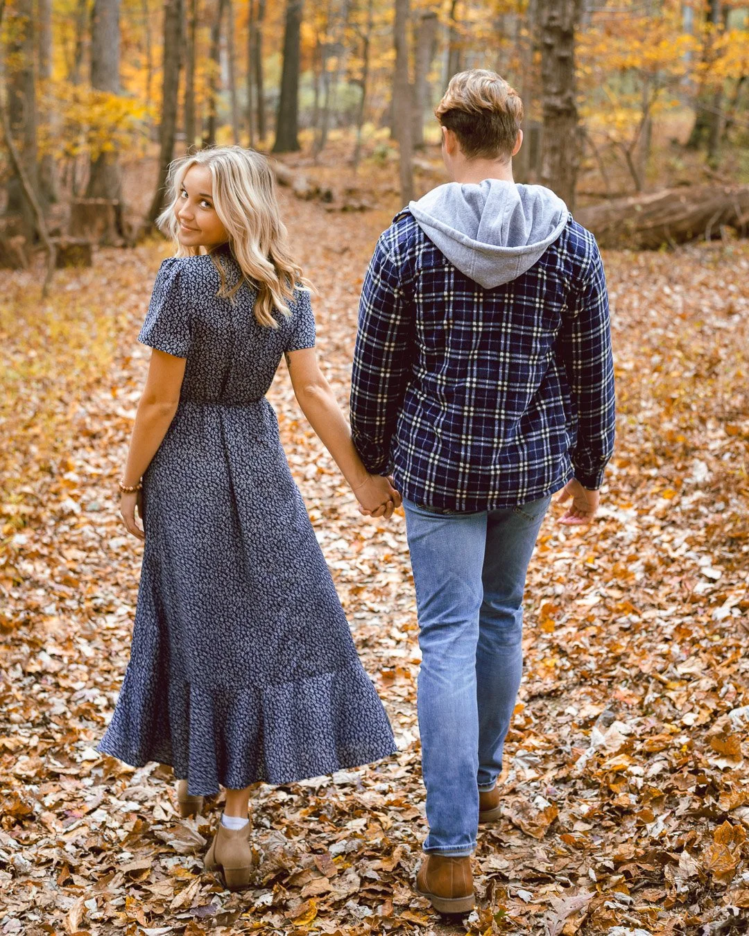 Couple walking in the woods
