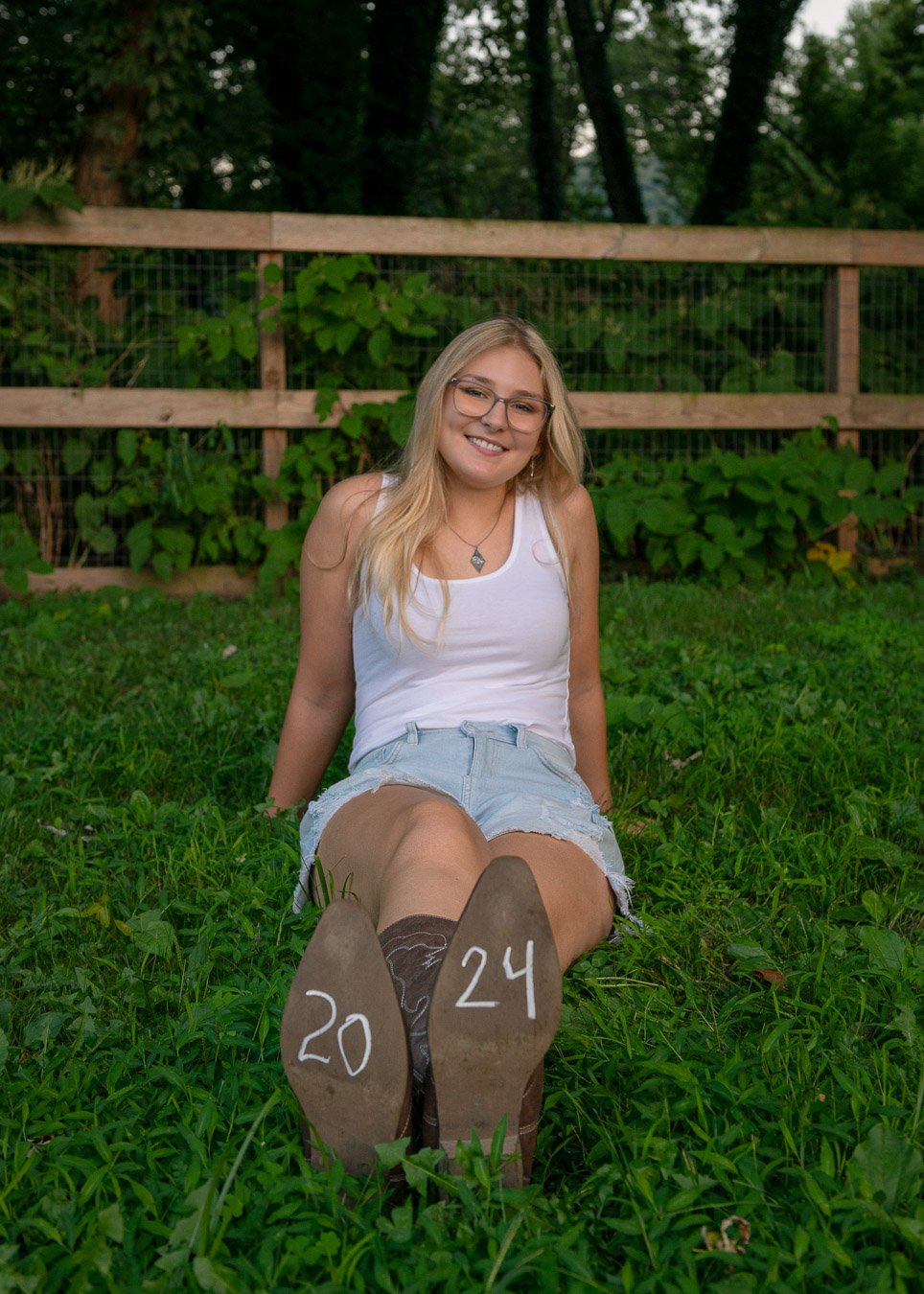 Ellie sitting in grass