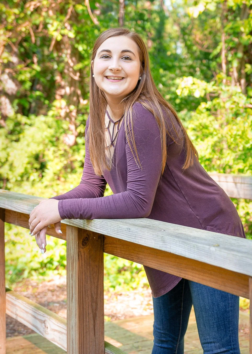 Natalie leaning on bridge