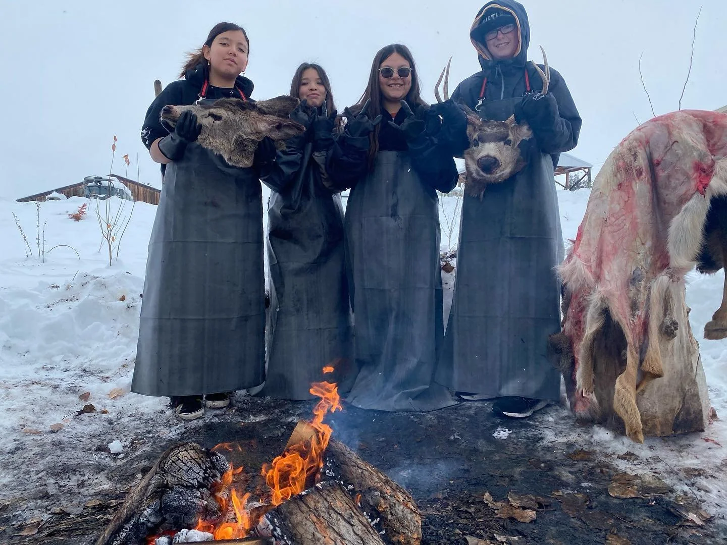 Deer processing field day with Paschal Sherman middle school students. Students learned skinning, butchering, hide fleshing and preservation, bone brother and fat tending.