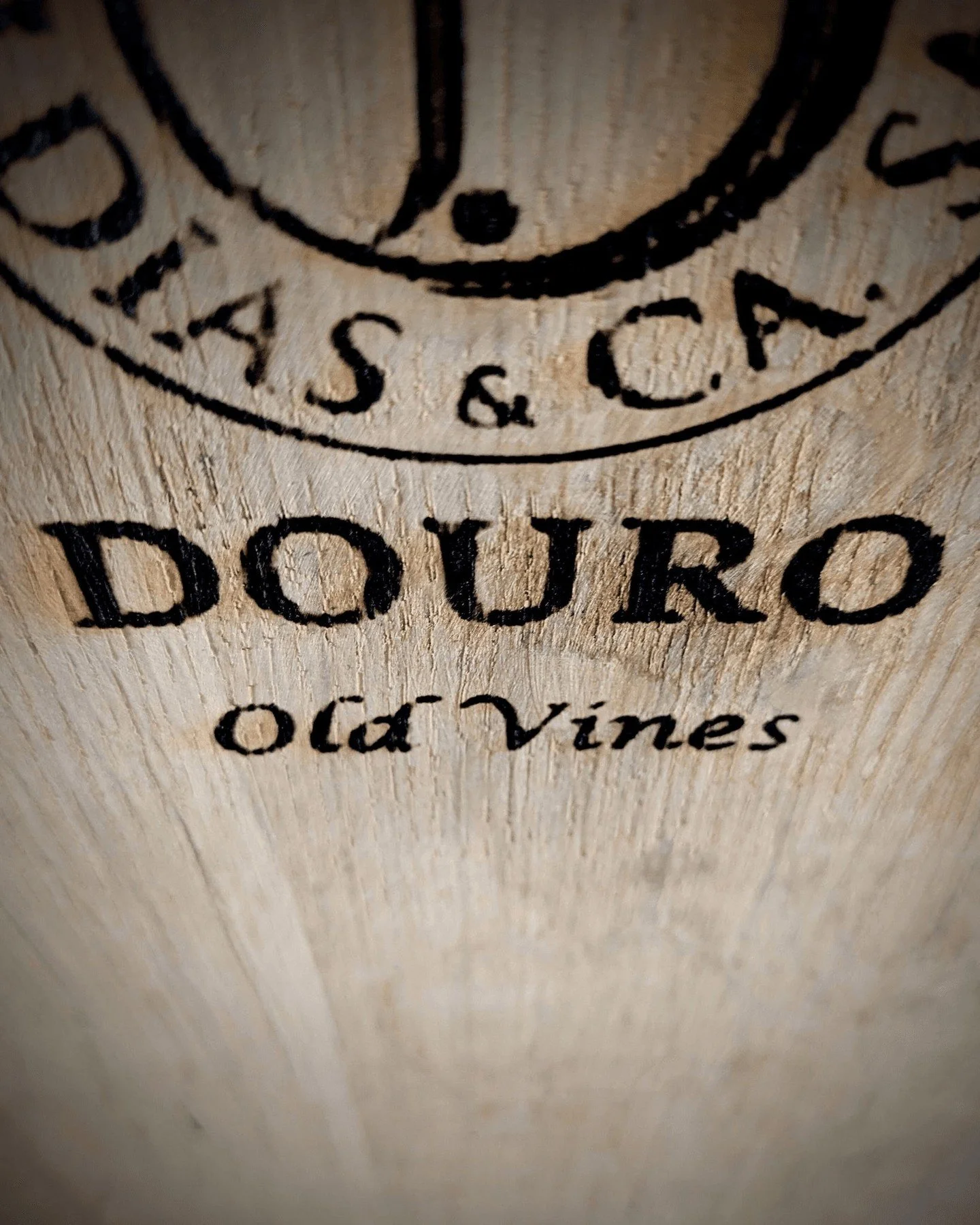 This barrel's journey commenced in the historic wine-making region of Portugal's Douro Valley. It once held wine crafted from the ancient vines thriving in the area, some of which are between 50 and 100 years old. With scorching temperatures and scan