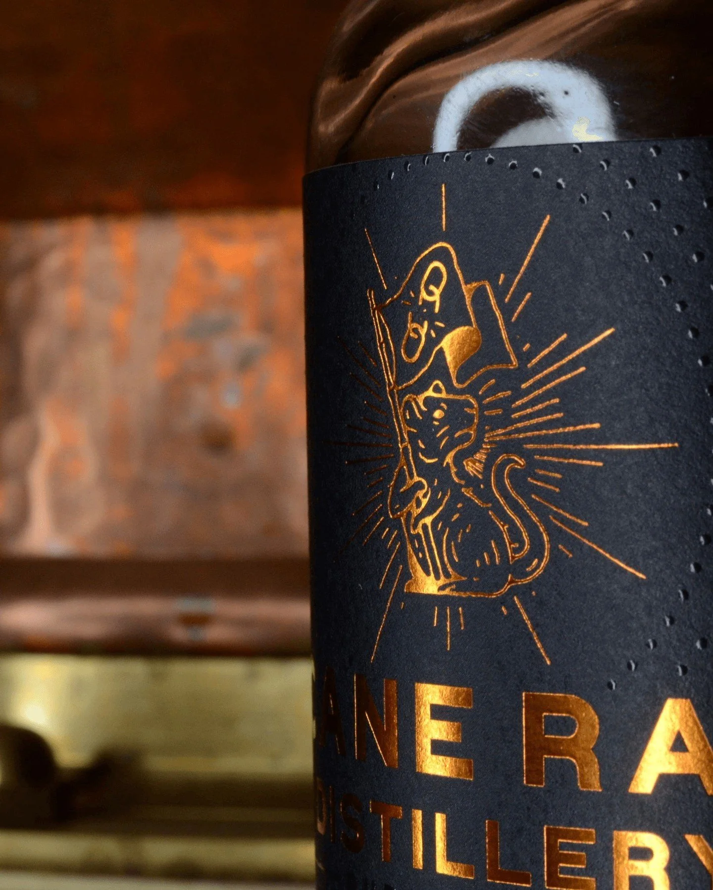 If you have ever held one of our bottles of rum, your have likely gently run your fingers over the label.

You probably did  this instinctively, without even thinking about  it. But, this is exactly what we intended. 

The raised dimples on its surfa