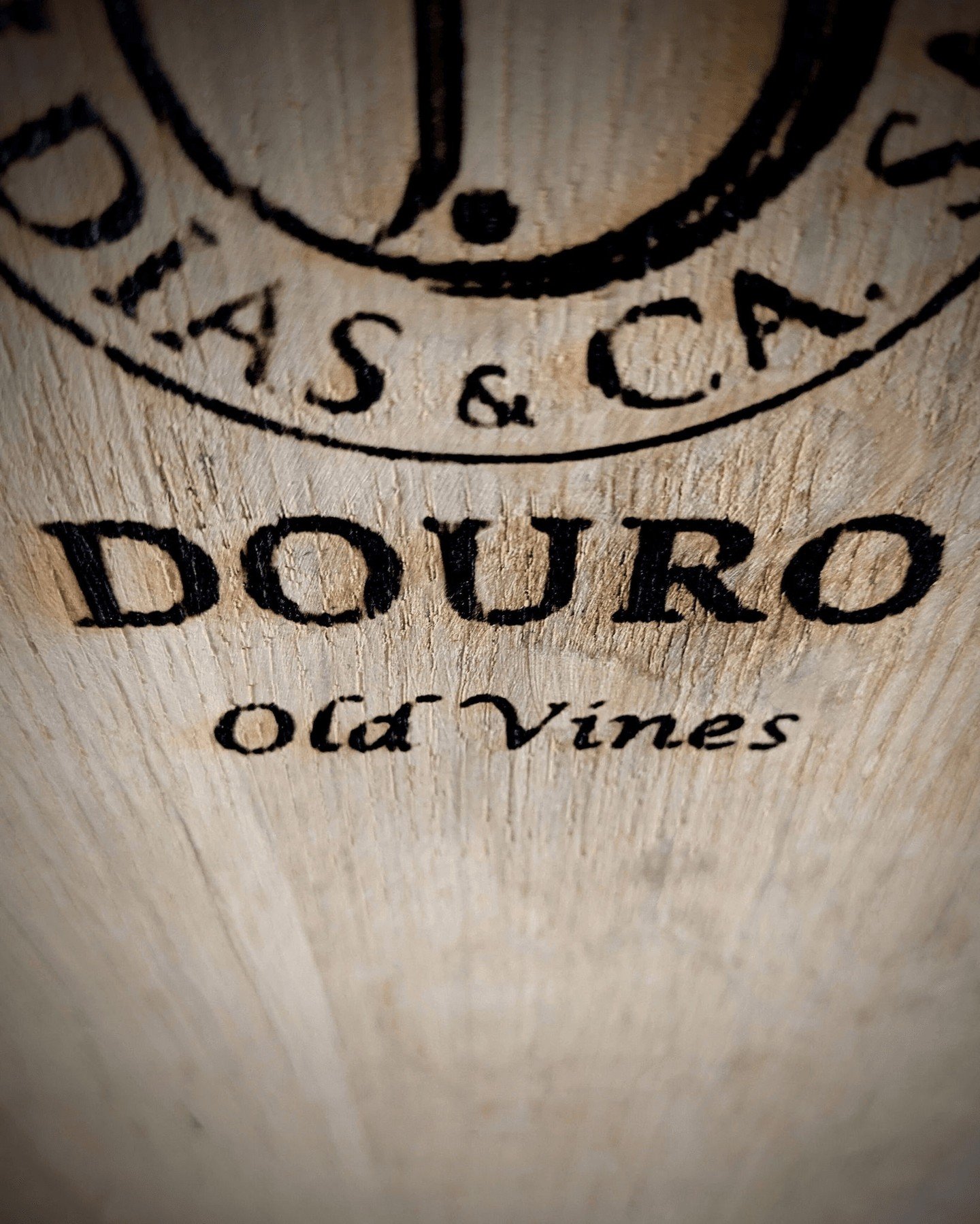 This barrel's journey commenced in the historic wine-making region of Portugal's Douro Valley. It once held wine crafted from the ancient vines thriving in the area, some of which are between 50 and 100 years old. With scorching temperatures and scan