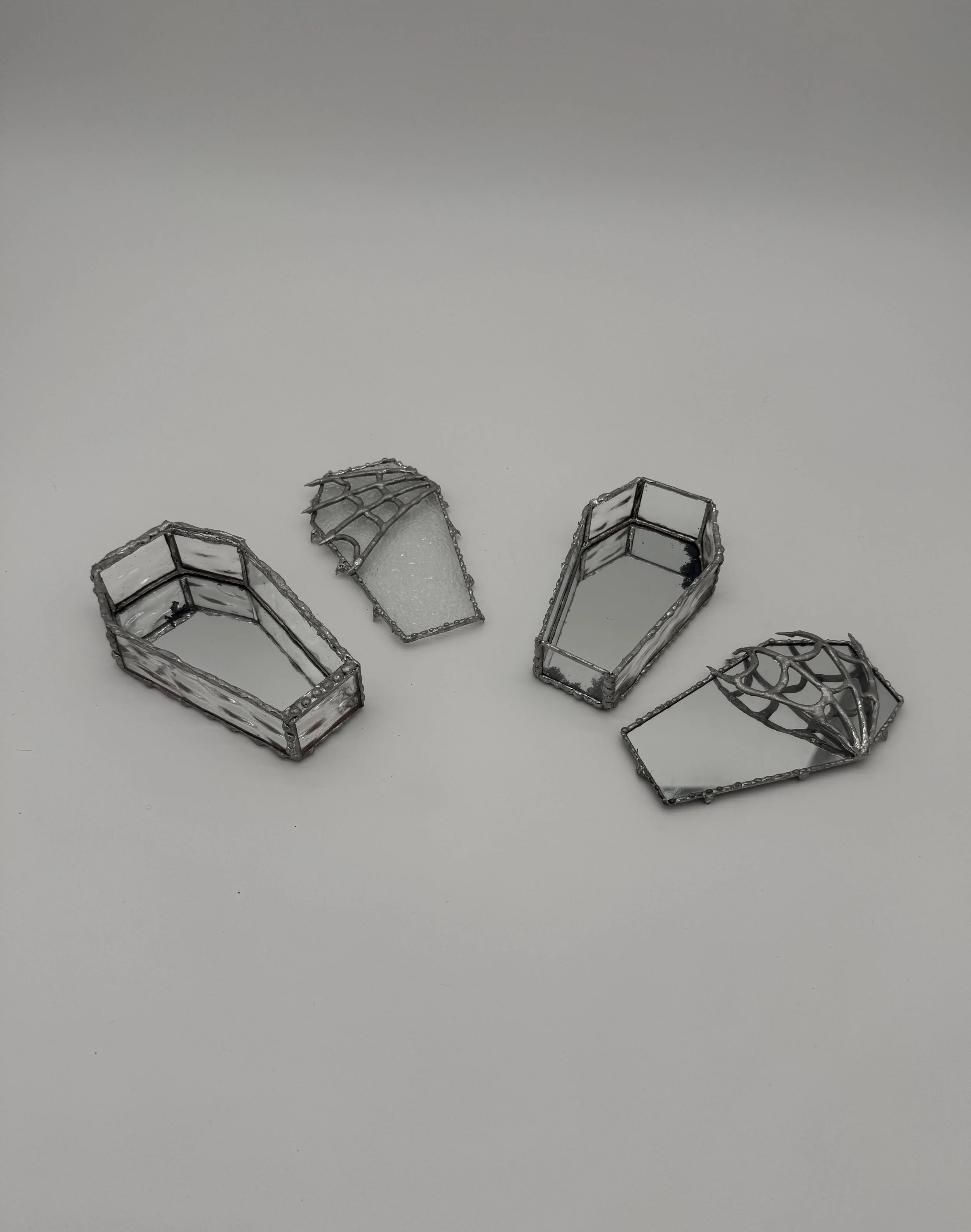 four glass coffins.jpg
