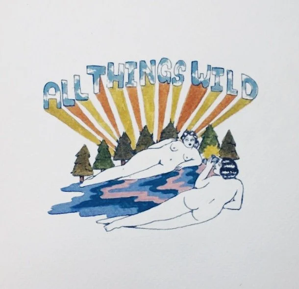 Colorful illustration of two nude women lying on the ground, with mountains, trees, and a sunrise in the background. The phrase "ALL THINGS WILD" is written above in stylized letters.