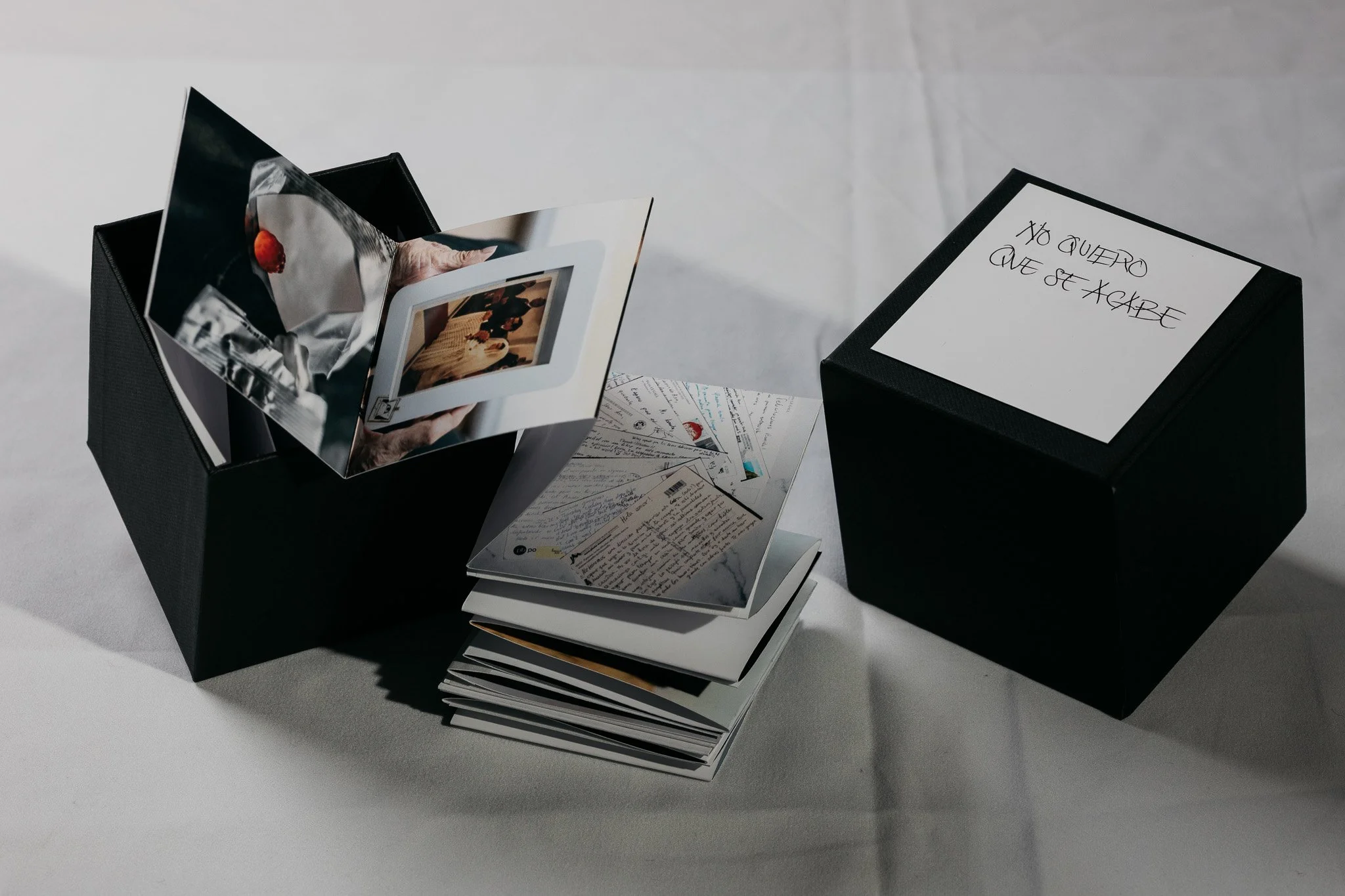 Installation view of folded image sequence and box