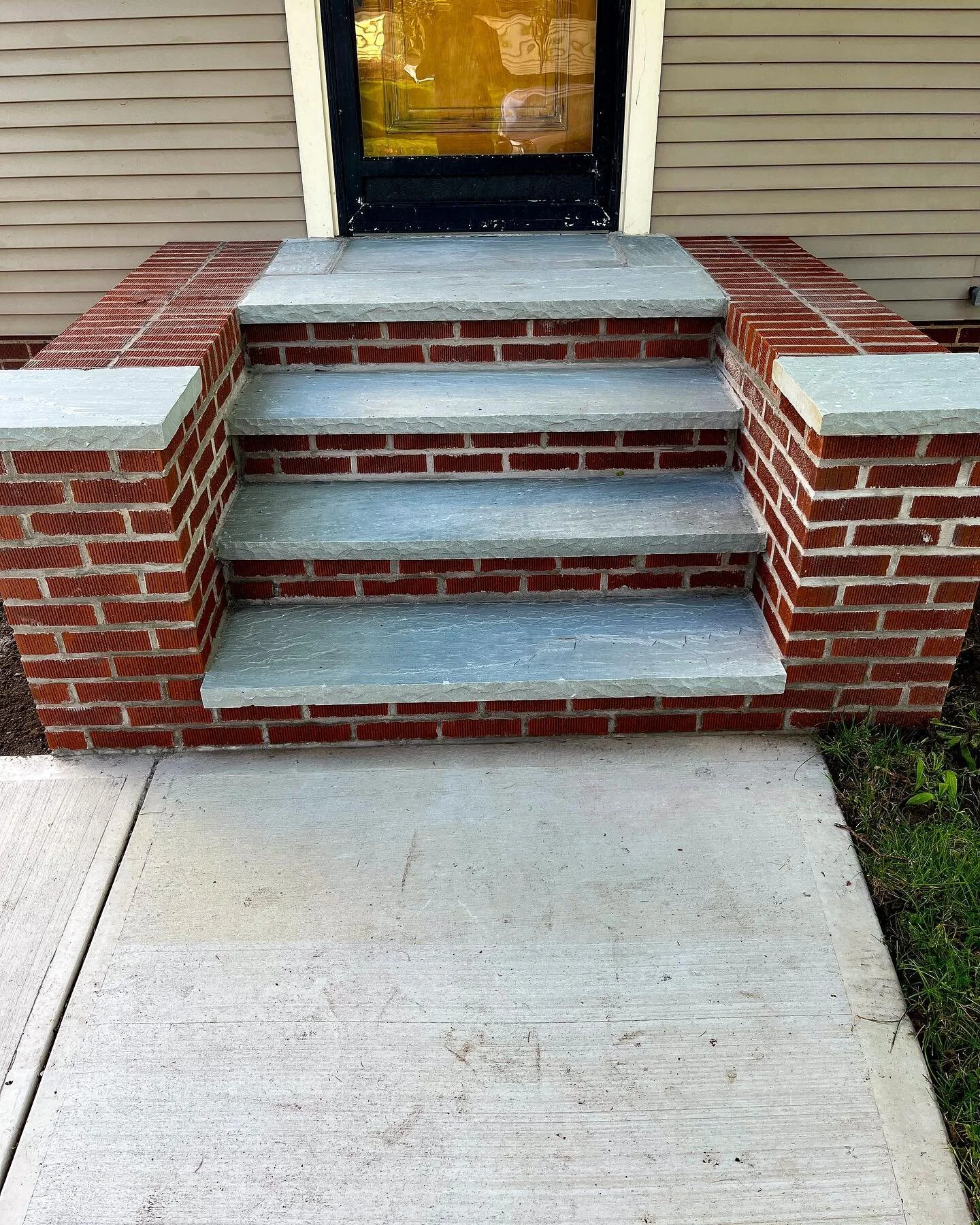 This entrance needed some love..
The old sidewalk was a trip hazard and the steps were even more dangerous.  Now, instead of being the entrance you avoid, its the one you want to show off!
Thanks for the help @heibergercontracting and 
@weckesserbric