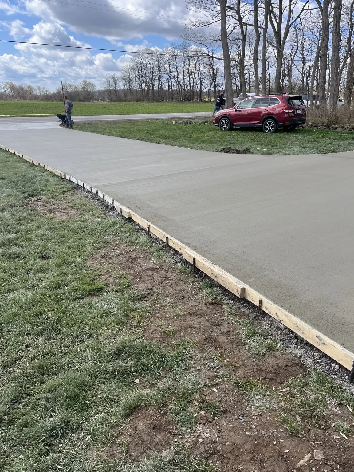 More than 2,000 square feet of new concrete being installed for a driveway and turnaround in Churchville, NY