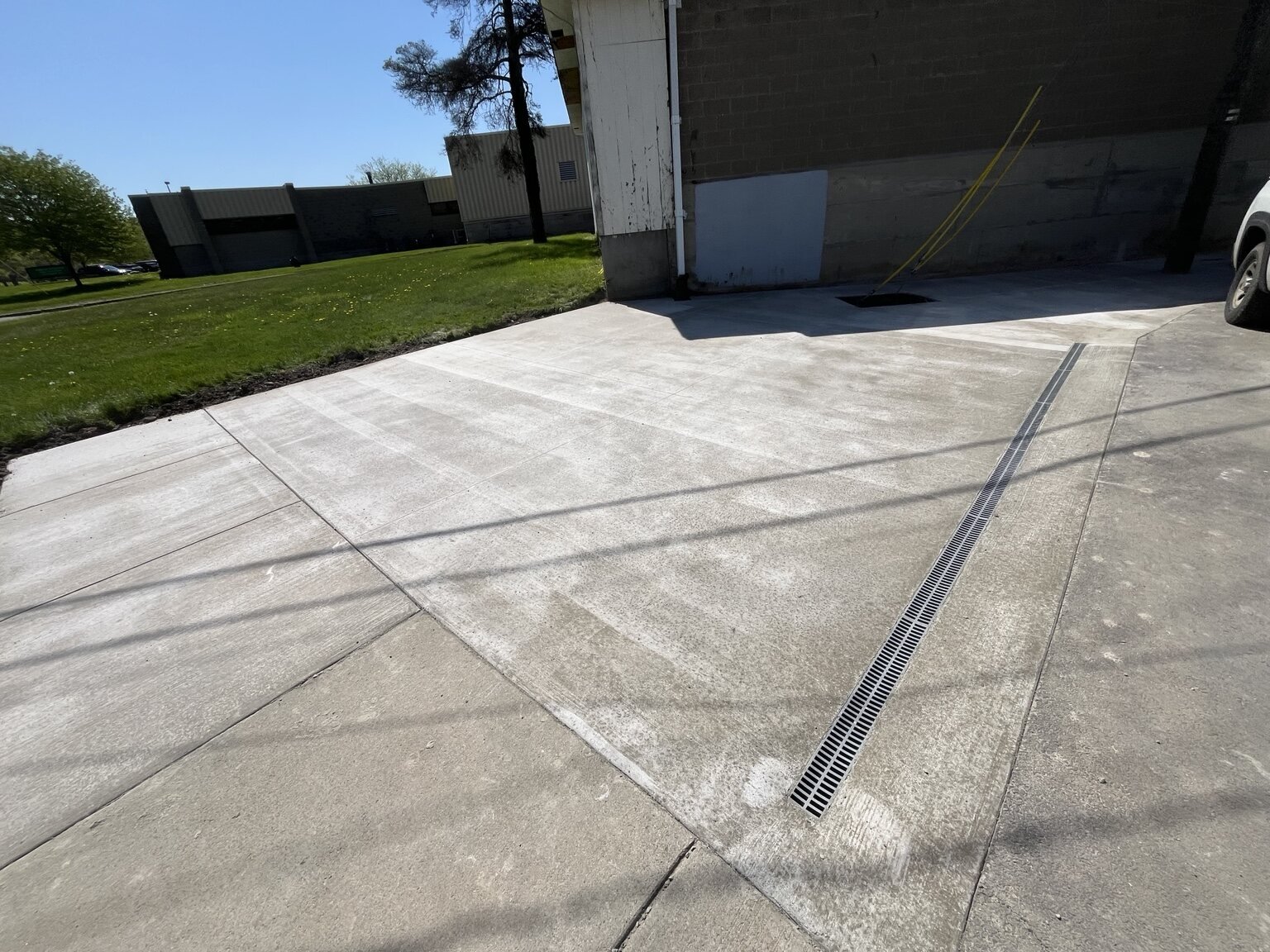 Commercial concrete parking expansion for Regain Physical Therapy in Pittsford, NY.