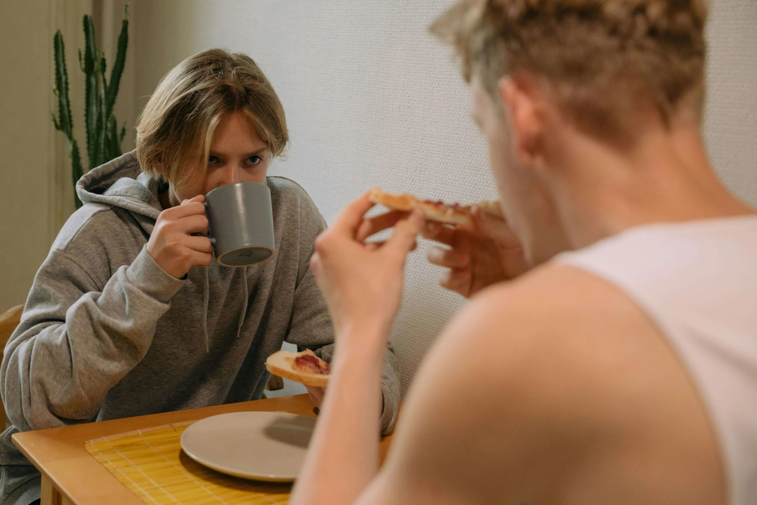 Adult sitting at a table with limited food choices, reflecting ARFID vs picky eating