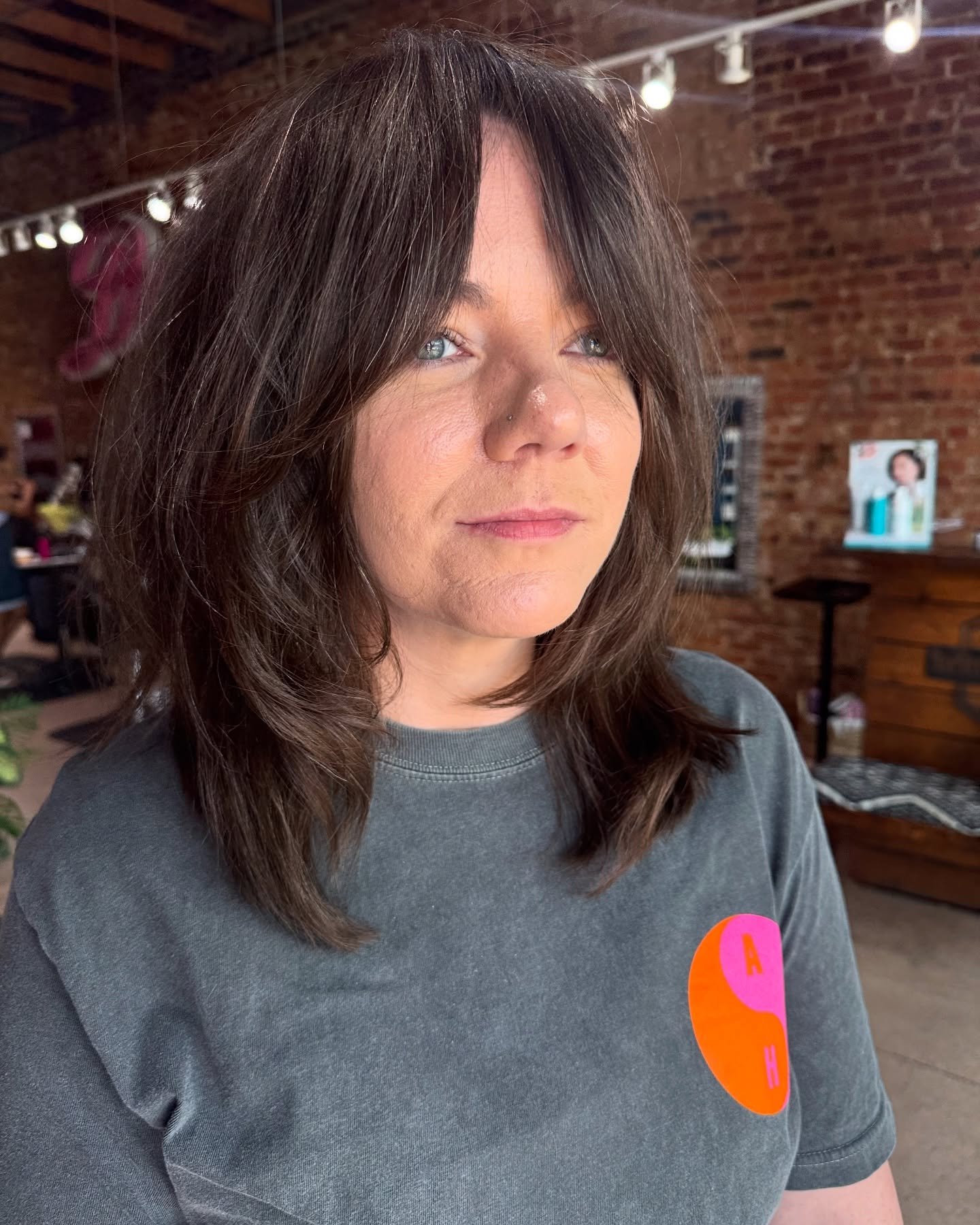 This hit. I didnt take a before because im tired of doing the same thing BUT we cut off over 7 inches and created an entirely new look with fringe!!! 

This was mainly hand styled. Heavy textured cut done w a razor. Hairstory Undressed in the crown f