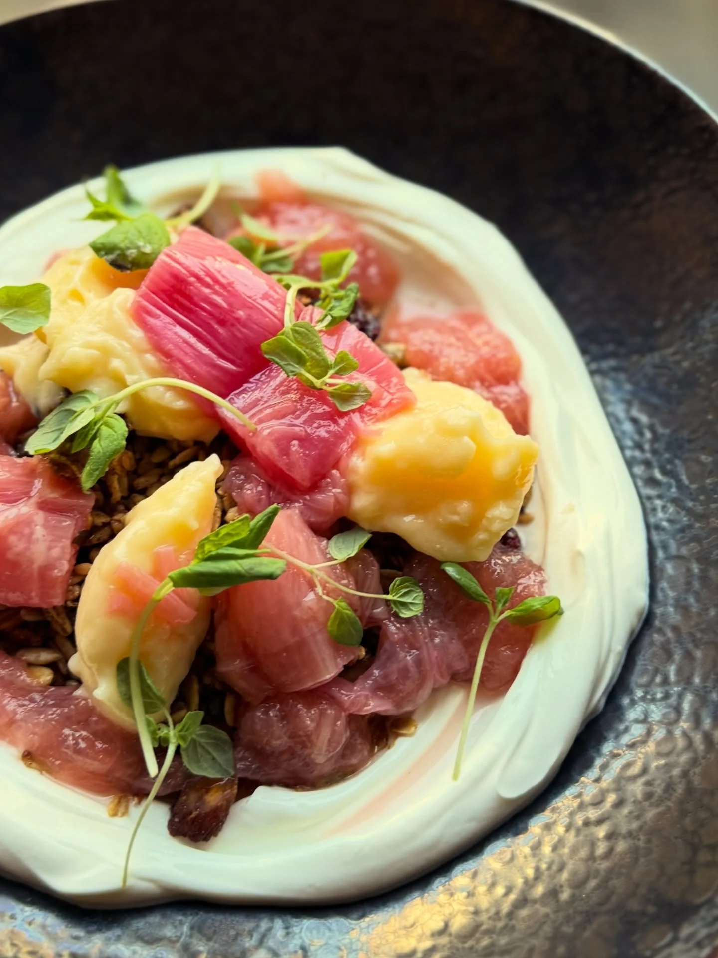 Spring has officially sprung. So we&rsquo;ve got some new dishes. Including THIS. The return of the rhubarb and lemon curd granola. Perfection on a plate 👌