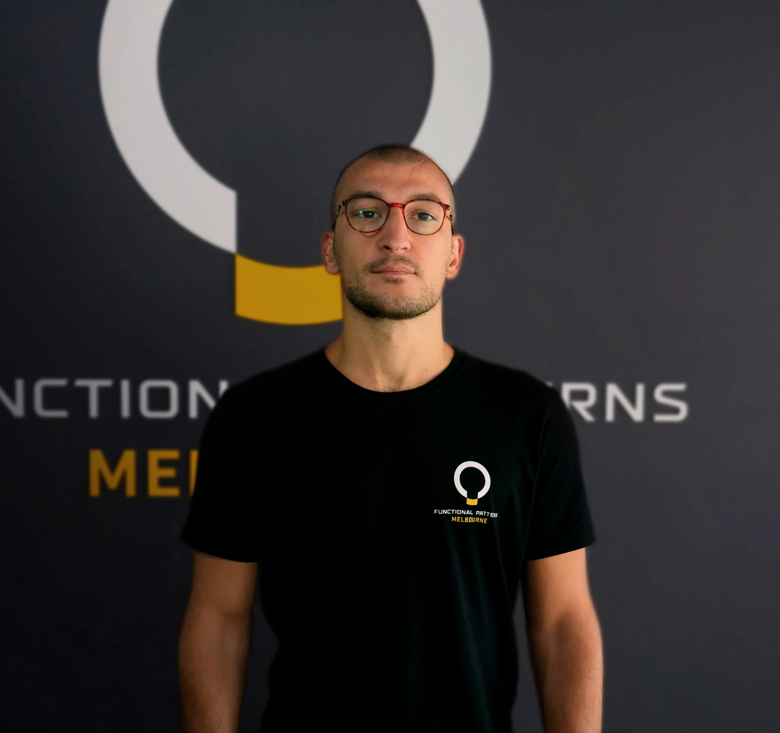 Steve Pitros, Personal Trainer at Functional Patterns Melbourne, portrait showing him smiling and professional, representing expertise in functional movement and posture correction.
