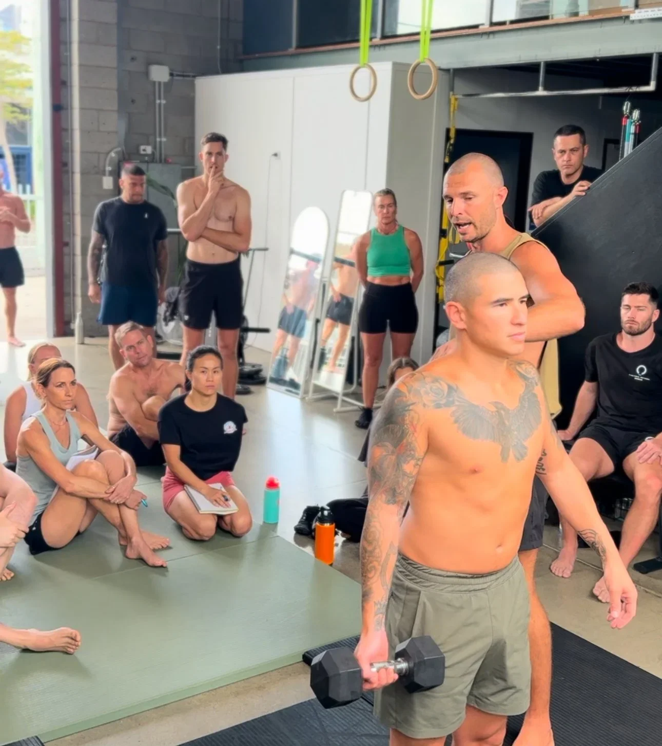 Functional Patterns instructor demonstrating postural correction and dynamic movement techniques at the Human Foundations Course 2025