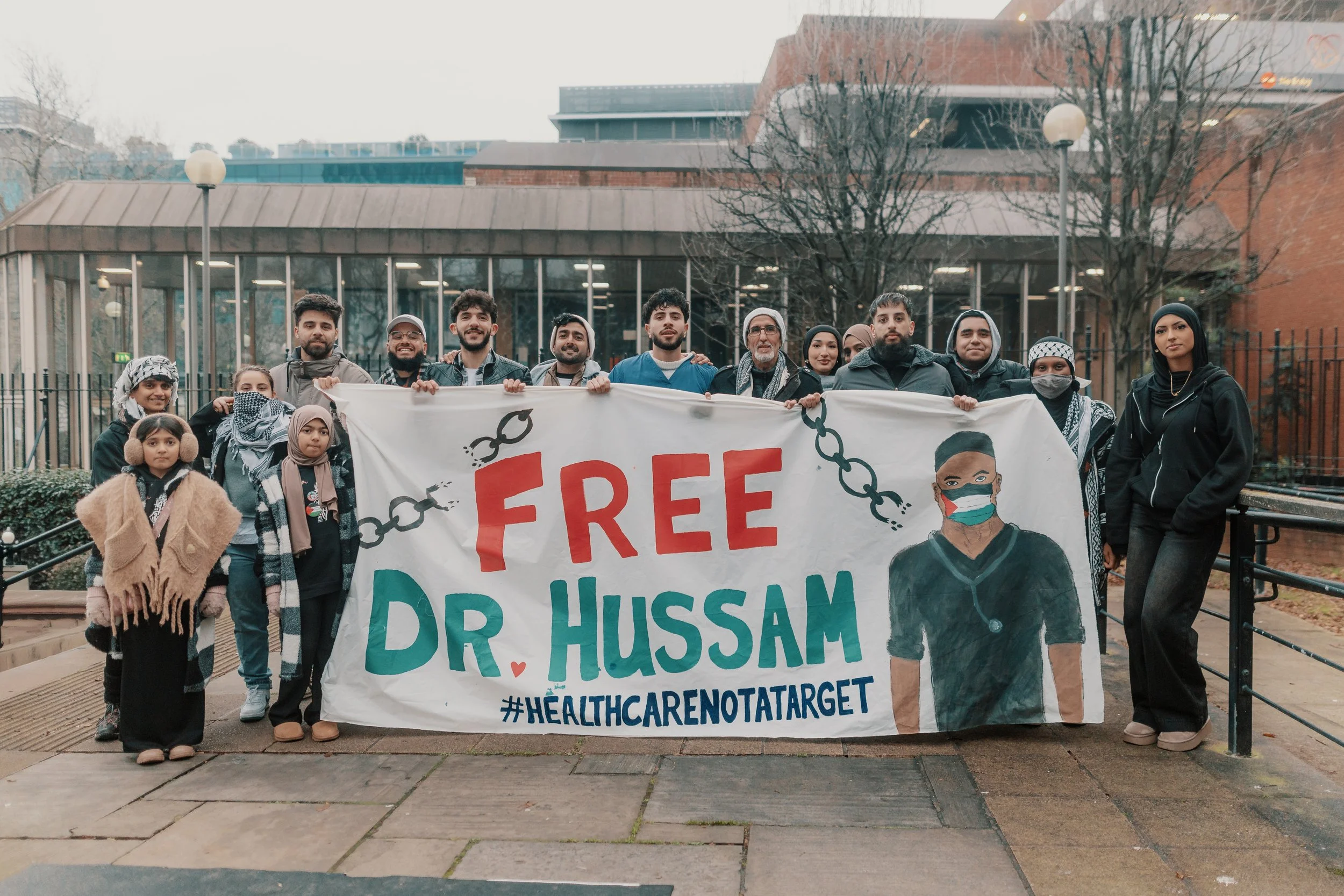 Protesters hold banner in Support of Doctor Hussam Abu Safiya in Leeds city centre at a pro palestine demonstration