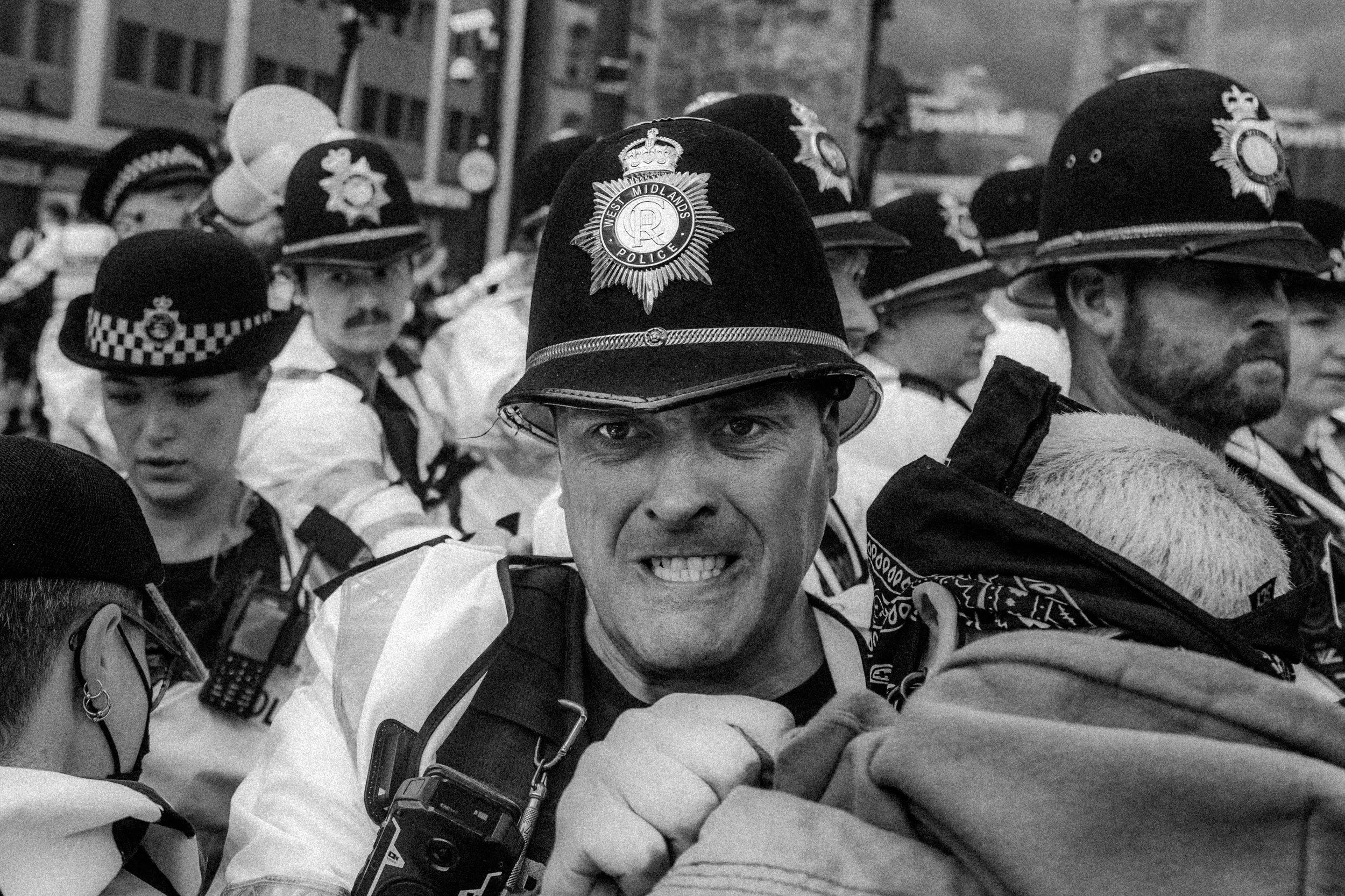 Police officer pushes anti-fascist protester in Birmingham