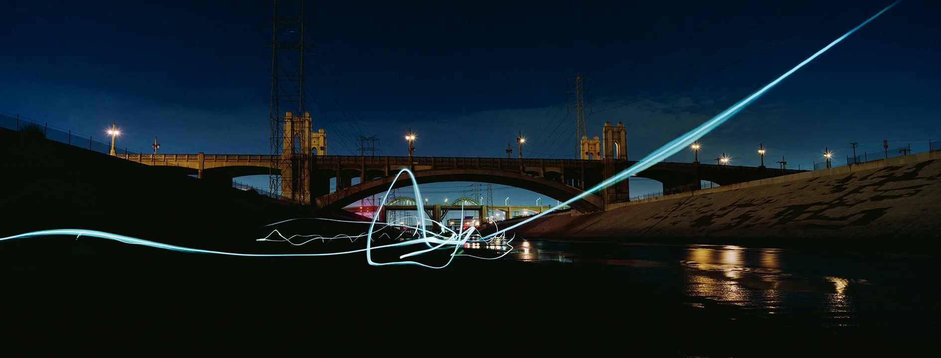   6th Street Bridge (memory of),  2015/2019 c-print 32 × 84 inches 
