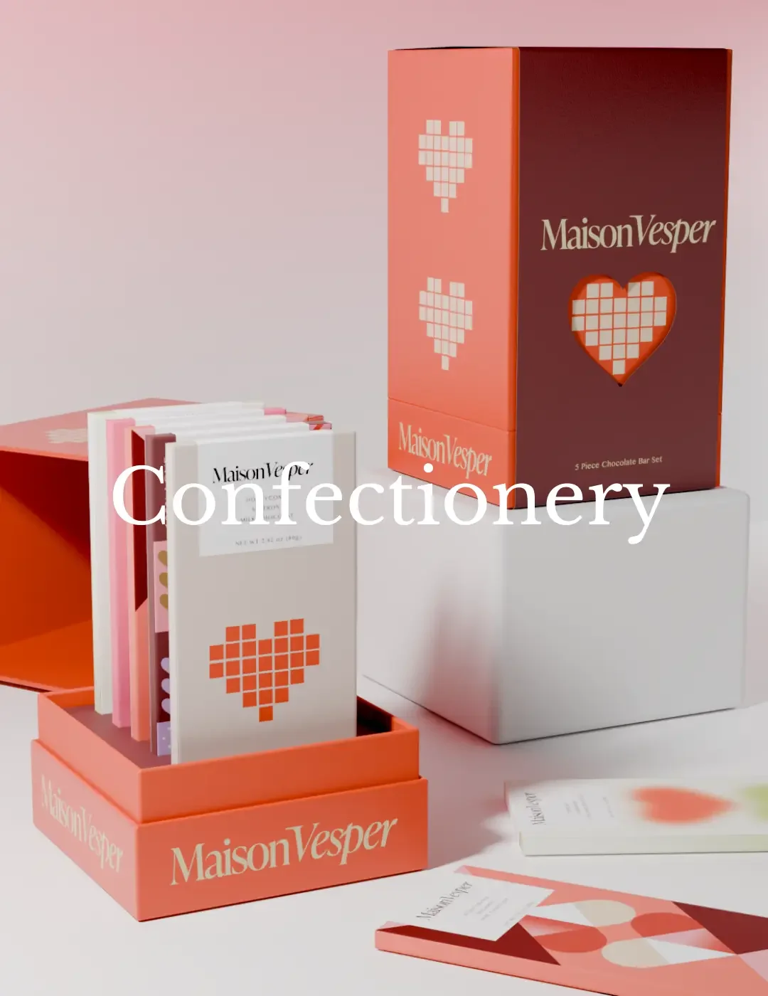 Open Valentine's Day chocolate box showing a custom plastic tray insert holding pralines.