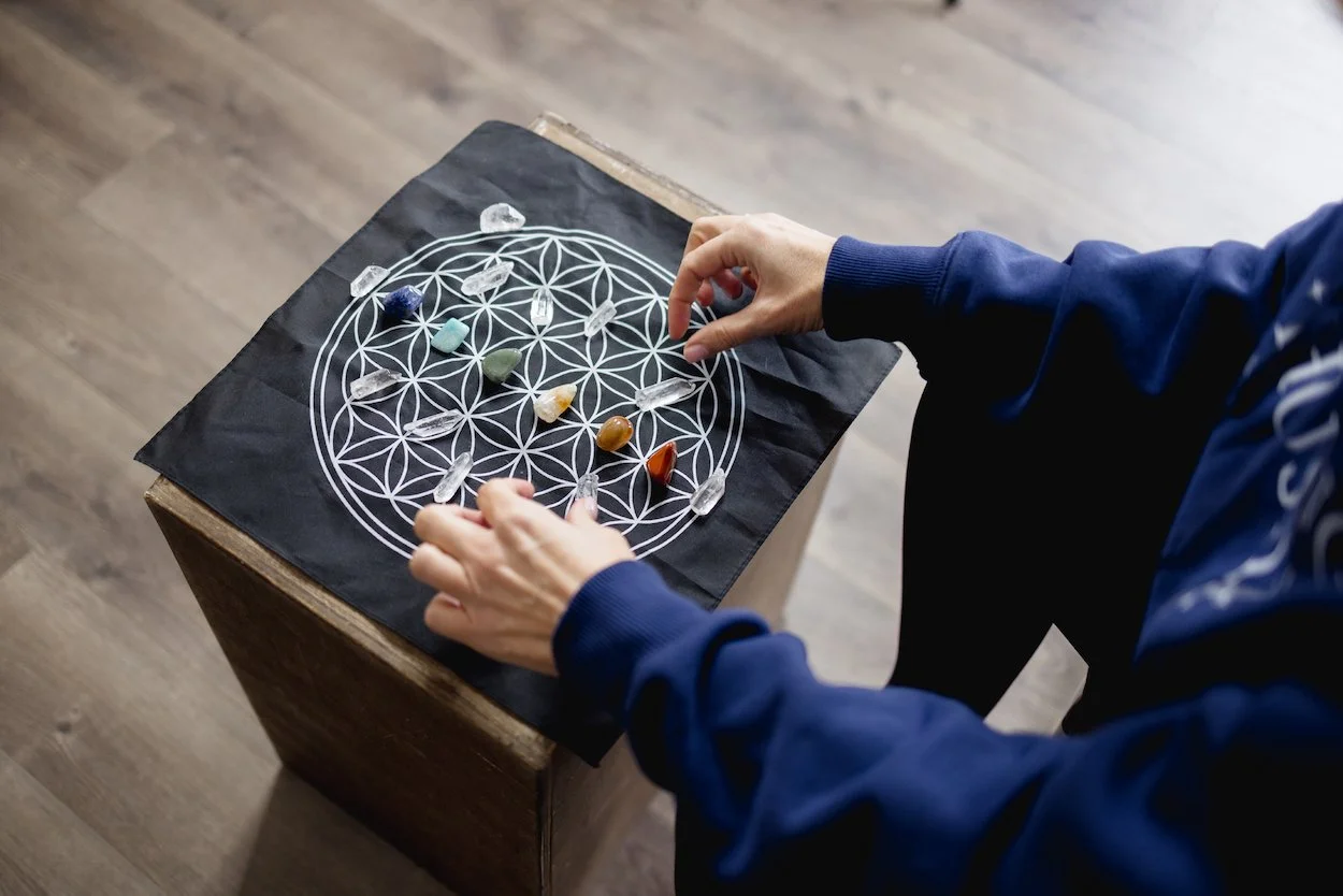 Hope with a chakra crystal grid restoring her energy body