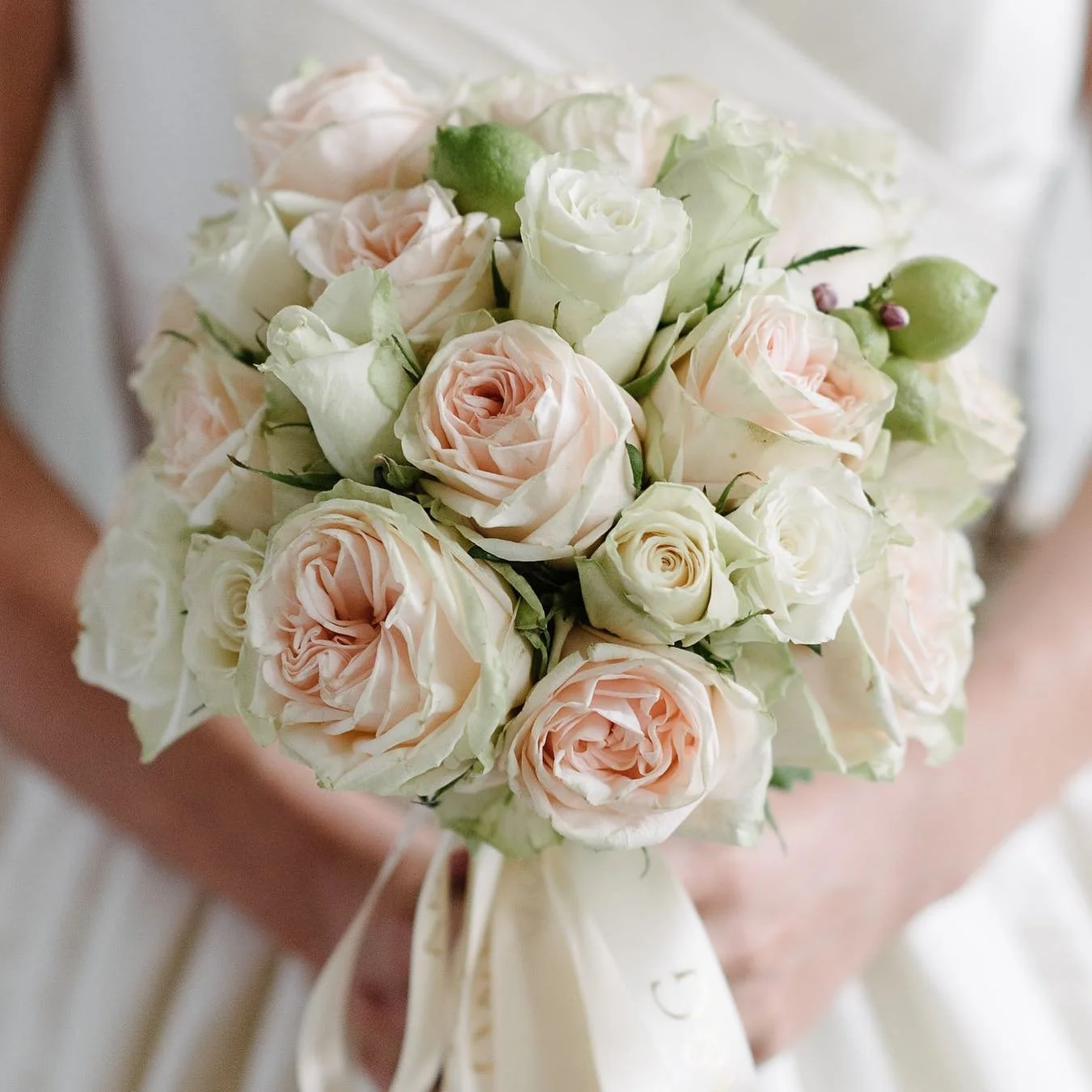 A Melbourne bride holds her wedding boquet