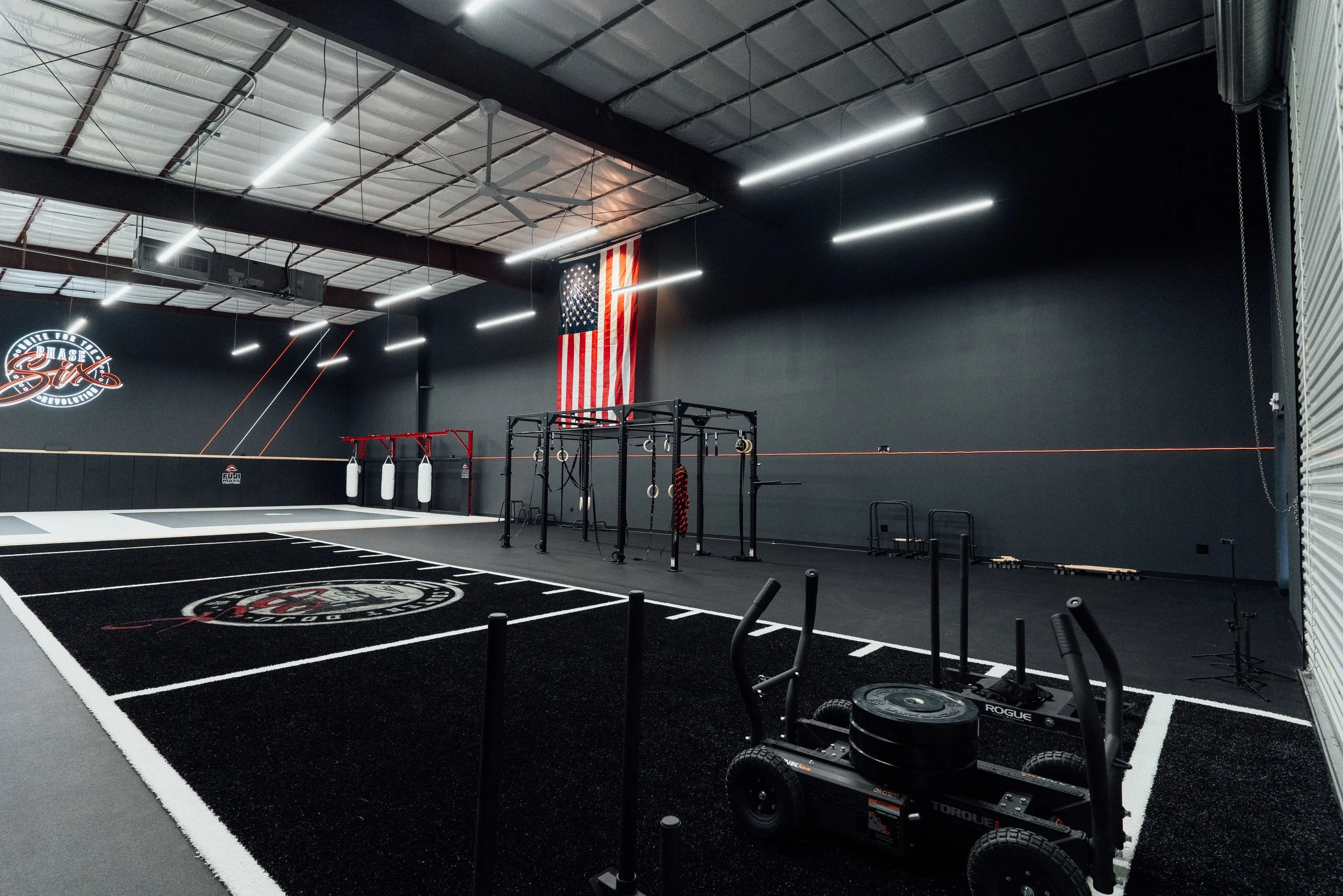 Gymnastics rig and rings at Phase SiX Content Dojo, a performance and content studio in South Austin