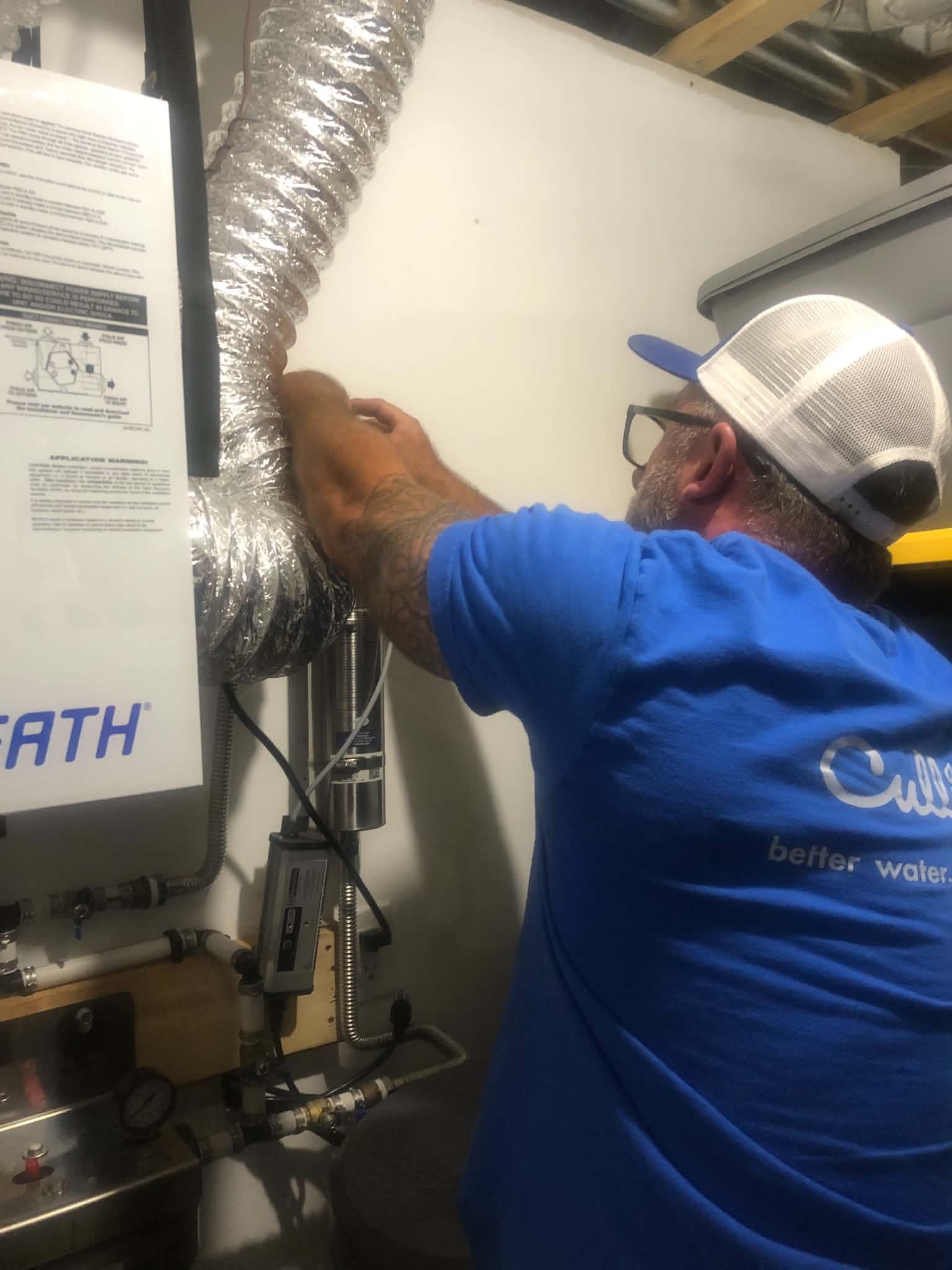 Culligan Service technician greeting home owner.