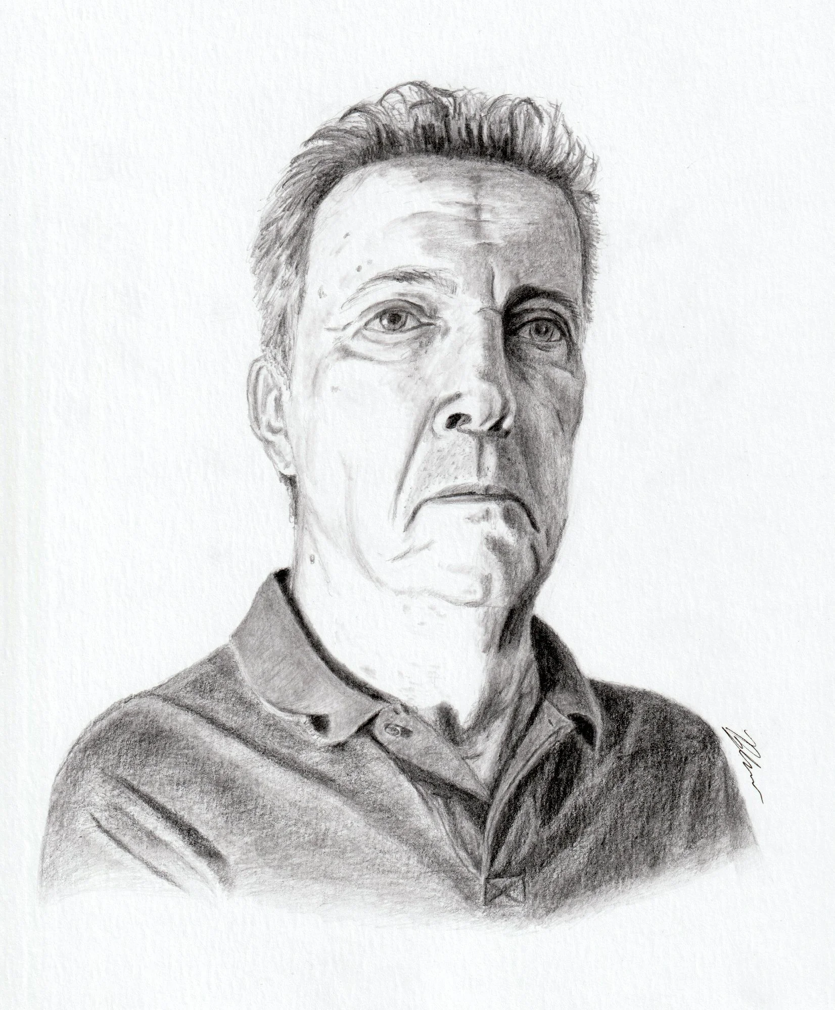 A detailed graphite pencil portrait of a middle-aged man with short hair, wearing a collared shirt, gazing slightly to the left. Observational life drawing for my application to the BMC program. Fall 2021.