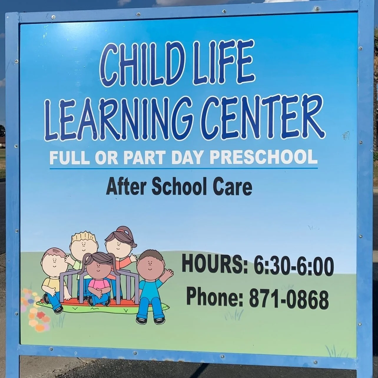 Sign for Child Life Learning Center advertising full or part day preschool and after school care with hours from 6:30 to 6:00, and a phone number 871-0868.