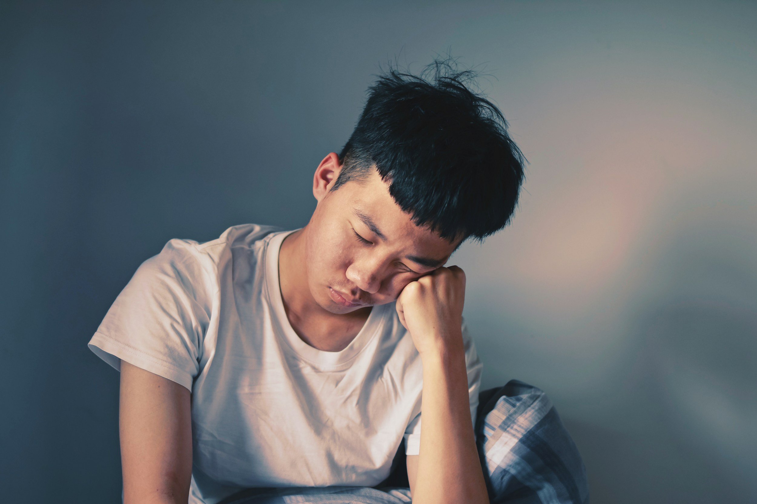 tired but wired person unable to rest despite sleeping enough