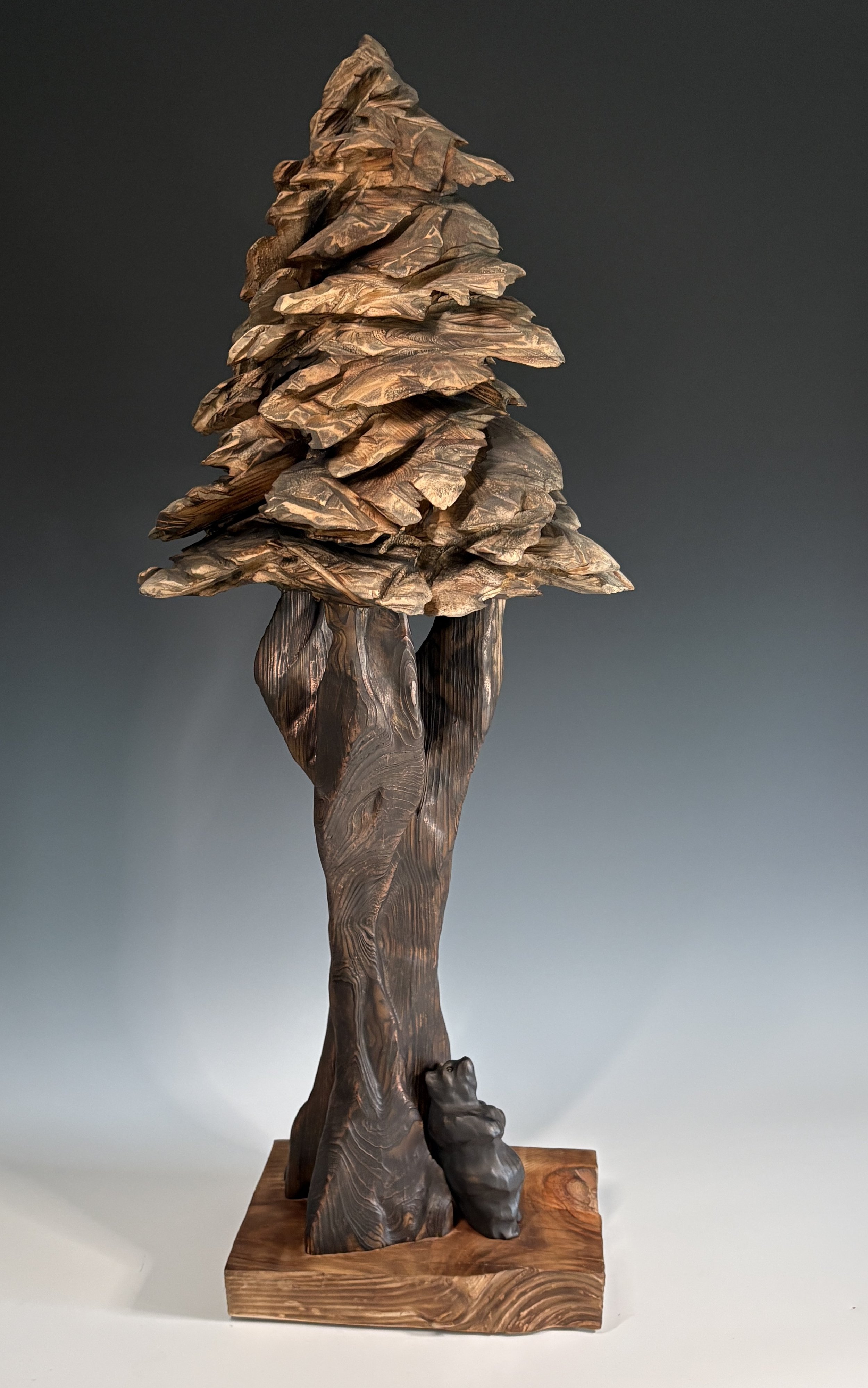 Solitude, 2025. White Pine, Leyland Cypress — 34 x 13 in. Private Collection