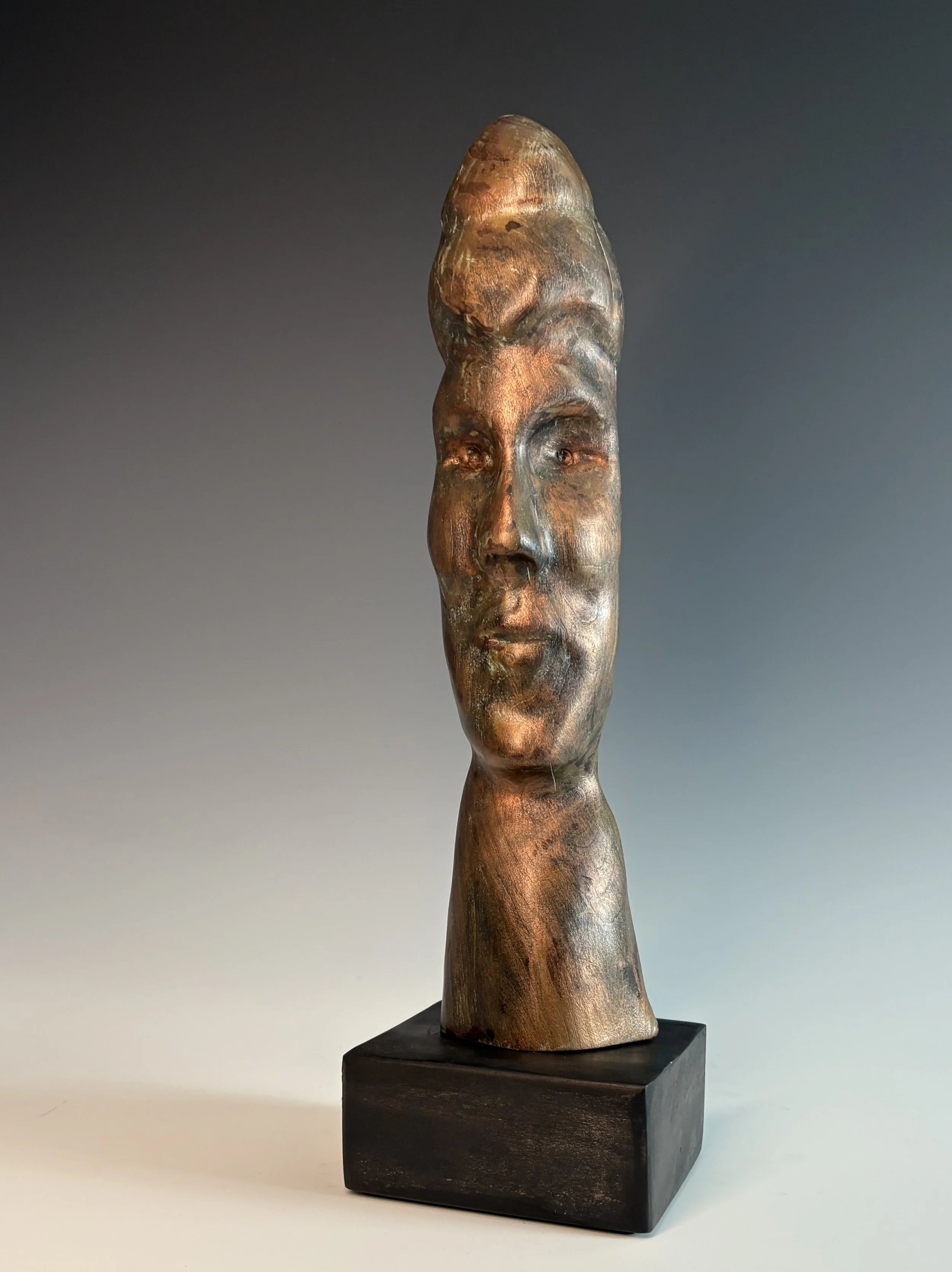 Homage to my uncle Puryear Mims, 2025. Black Cherry, copper coating — 16 x 5 in.