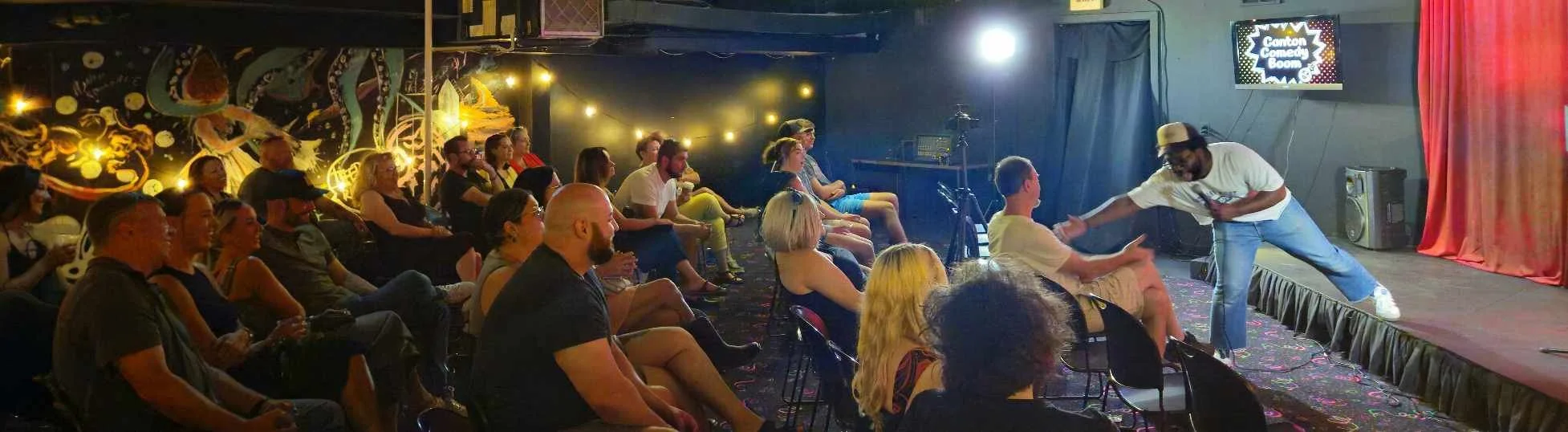 stand up comedian on stage at canton comedy boom in canton, ohio