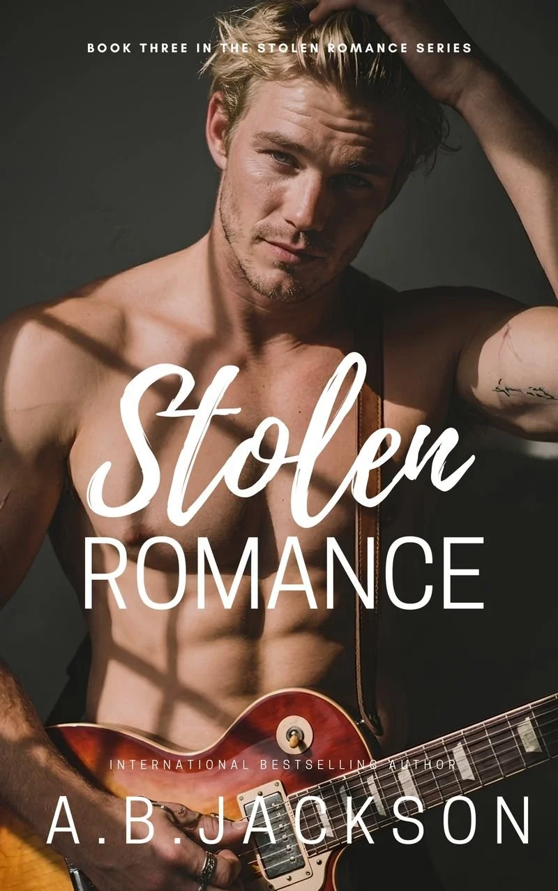 Book cover of "Stolen Romance" by A.B. Jackson. Developmental and line editing services provided by Dakota for this MM romance novel.