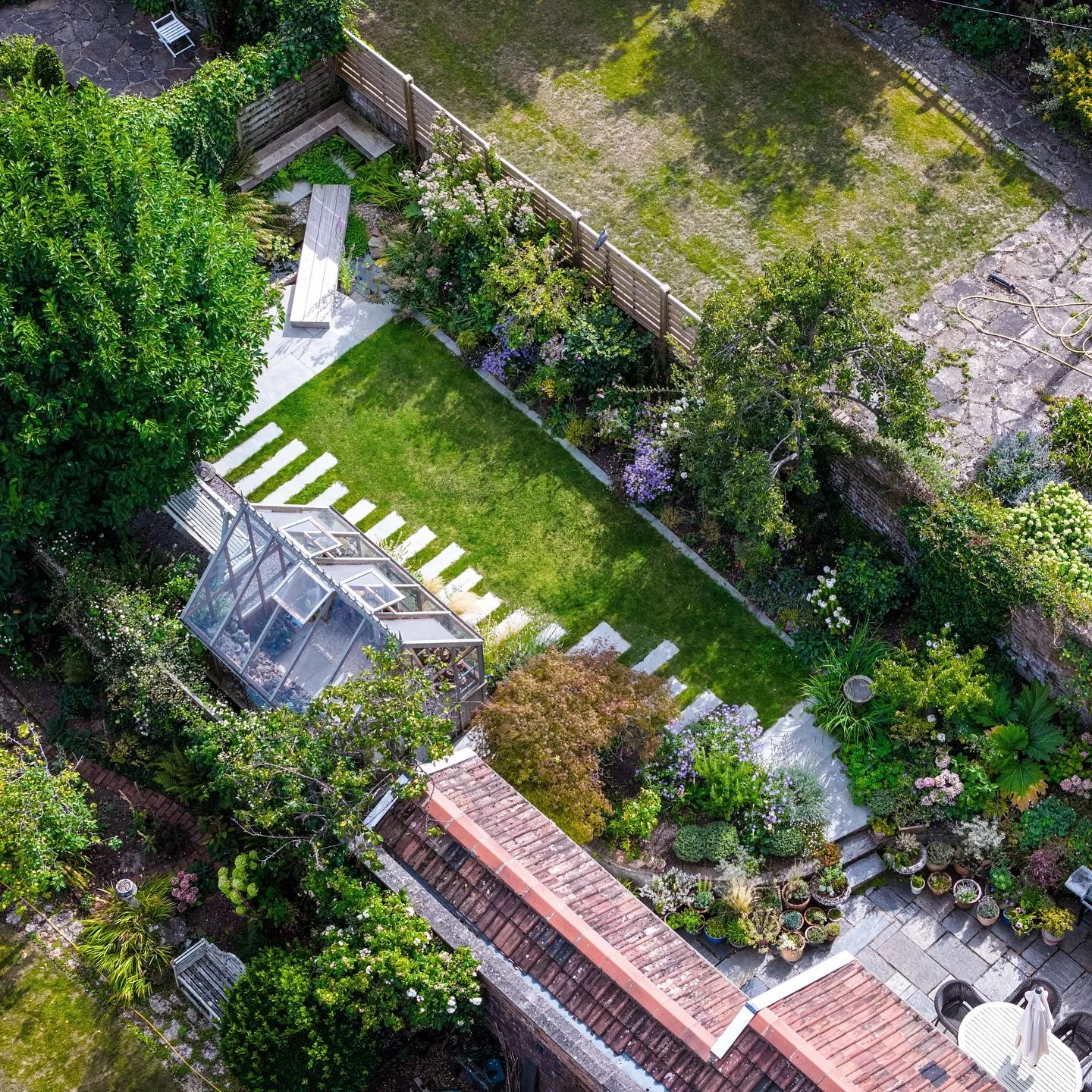 This garden grows. This garden has water, trees and flowers. And a cacti house! Living the Dream! One of my favourite design in a day overlays.