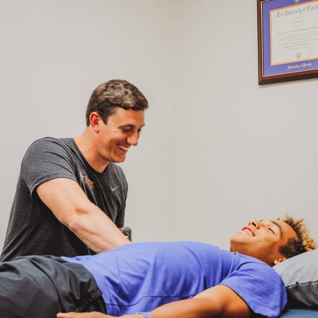 Doctorate PT working with athlete