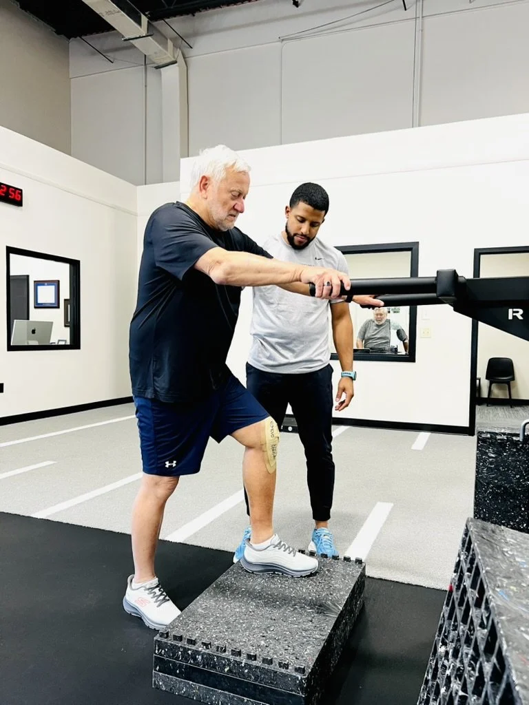 Dr. JJ Martinez working with a patient