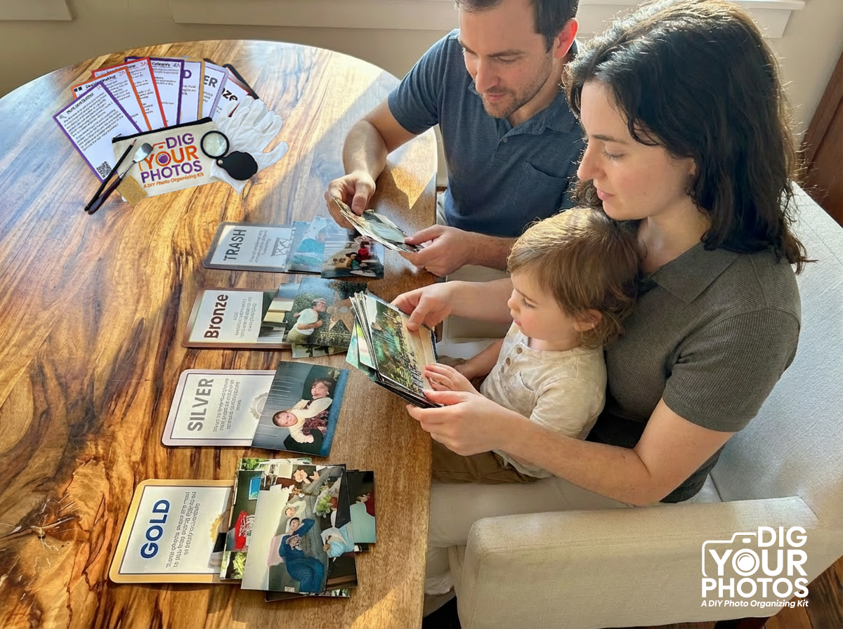 Family sorting printed photos with DIG YOUR PHOTOS!