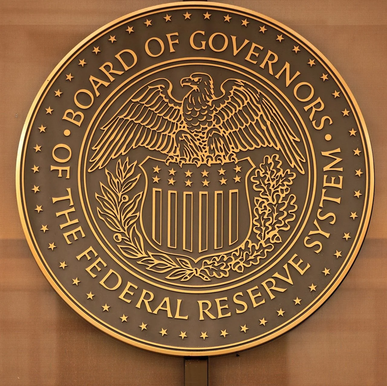 Seal of the Board of Governors of the Federal Reserve System featuring an eagle and shield.